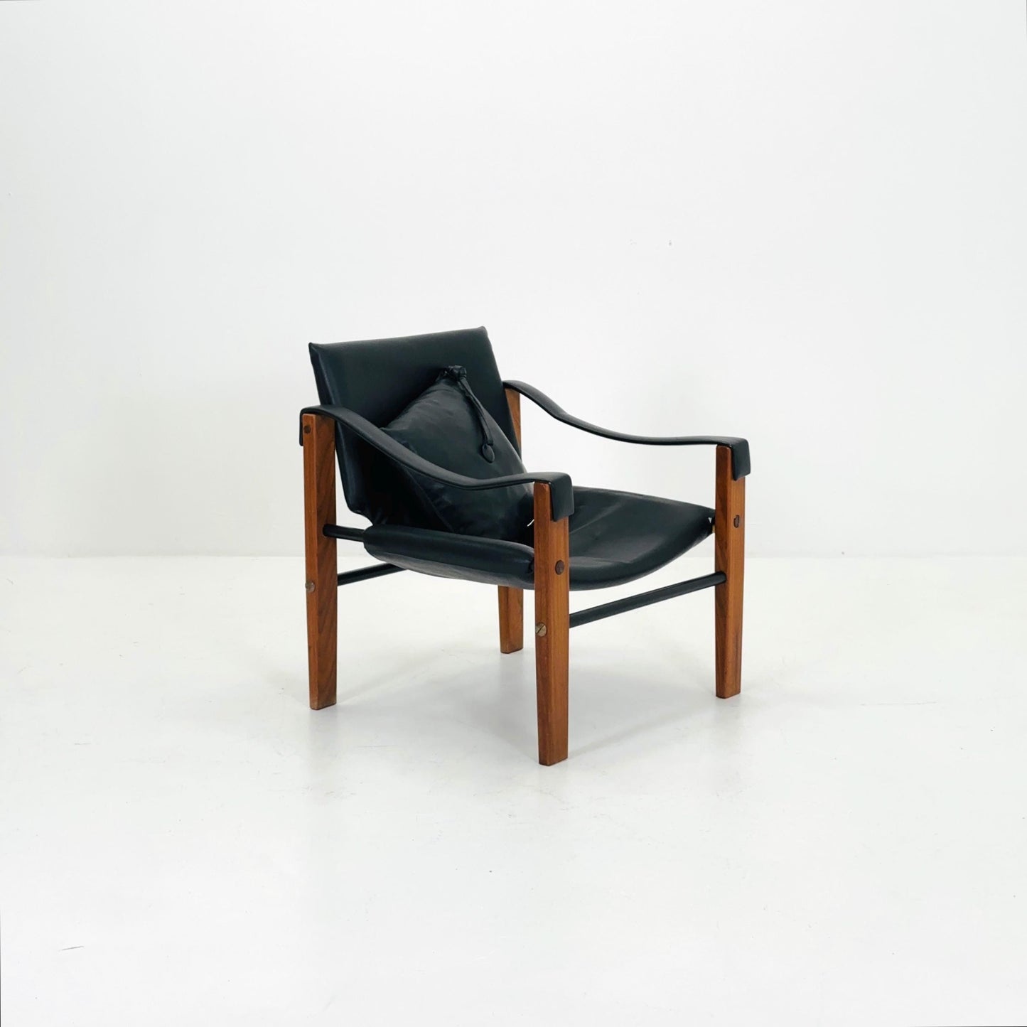 Mid century black leather Safari armchairs from Arkana by Maurice Burke, United Kingdom 1970s Scotland