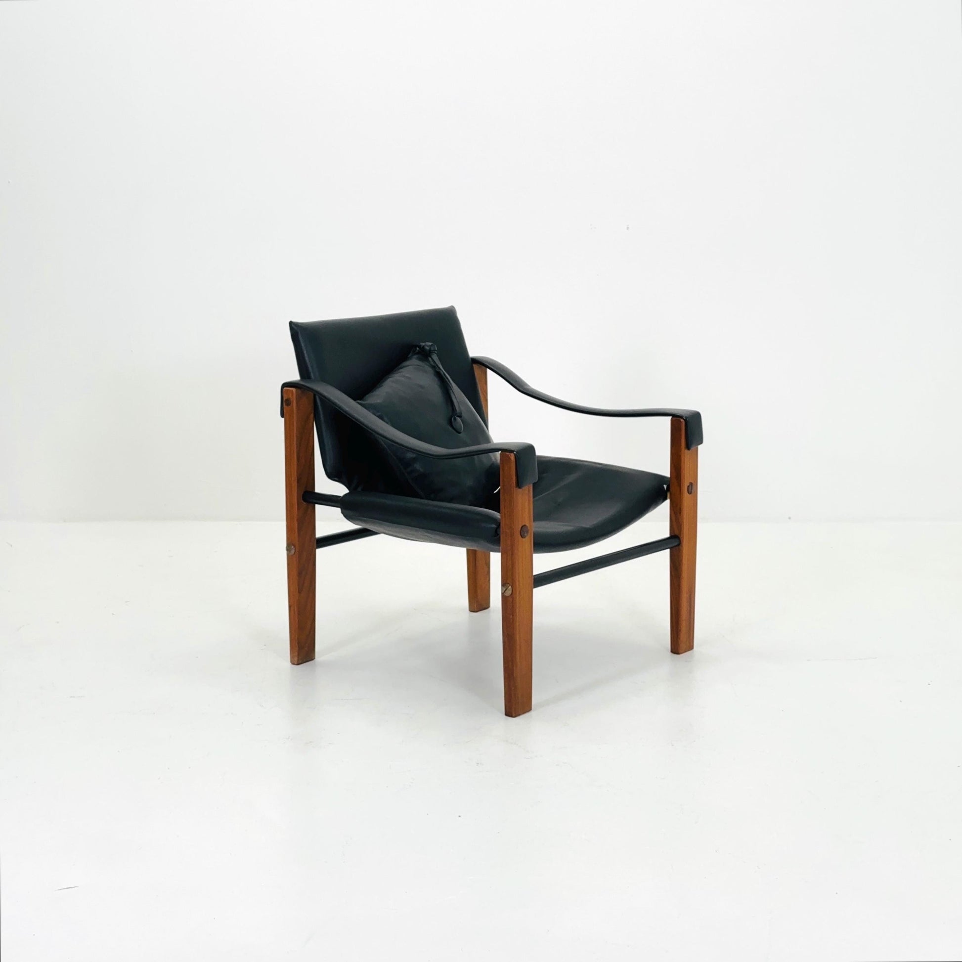 Mid century black leather Safari armchairs from Arkana by Maurice Burke, United Kingdom 1970s Scotland