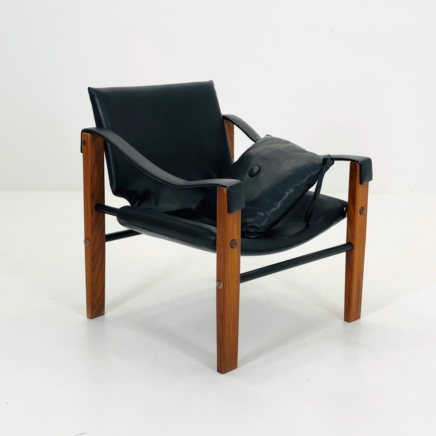 Mid century black leather Safari armchairs from Arkana by Maurice Burke, United Kingdom 1970s Scotland
