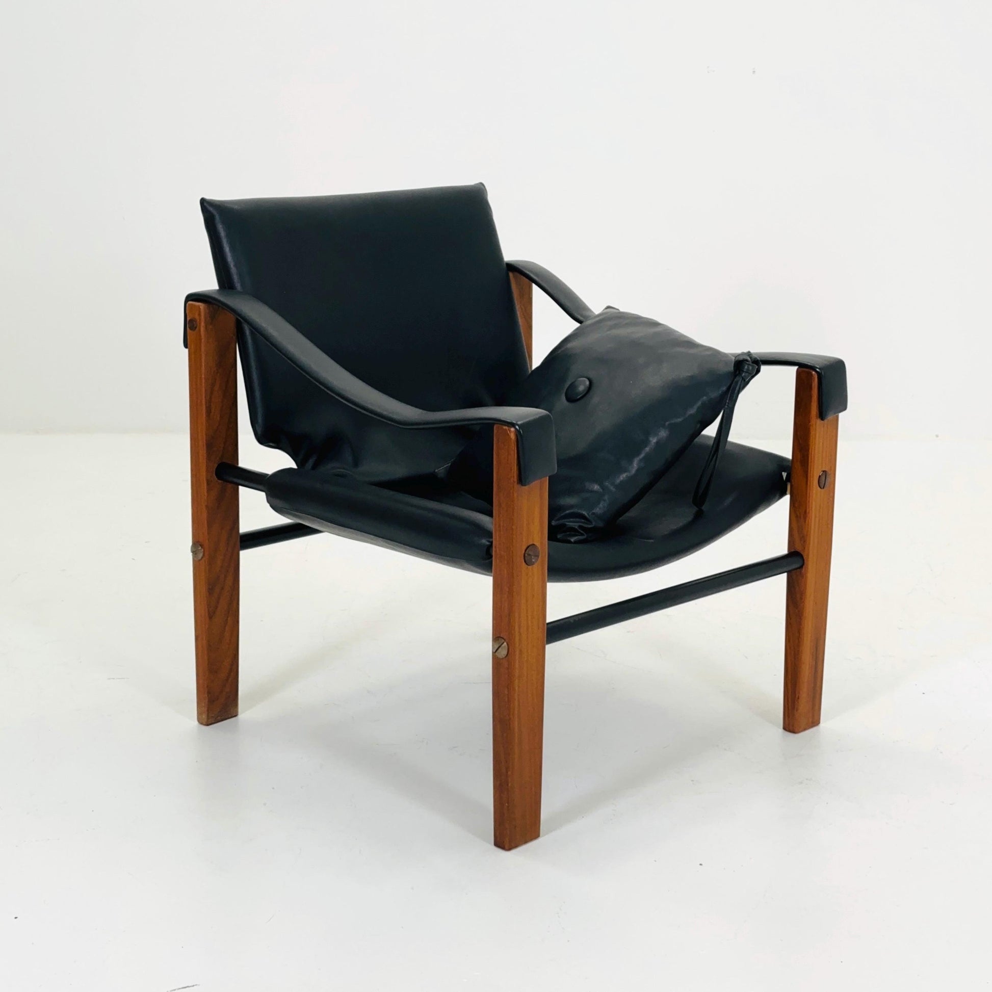 Mid century black leather Safari armchairs from Arkana by Maurice Burke, United Kingdom 1970s Scotland
