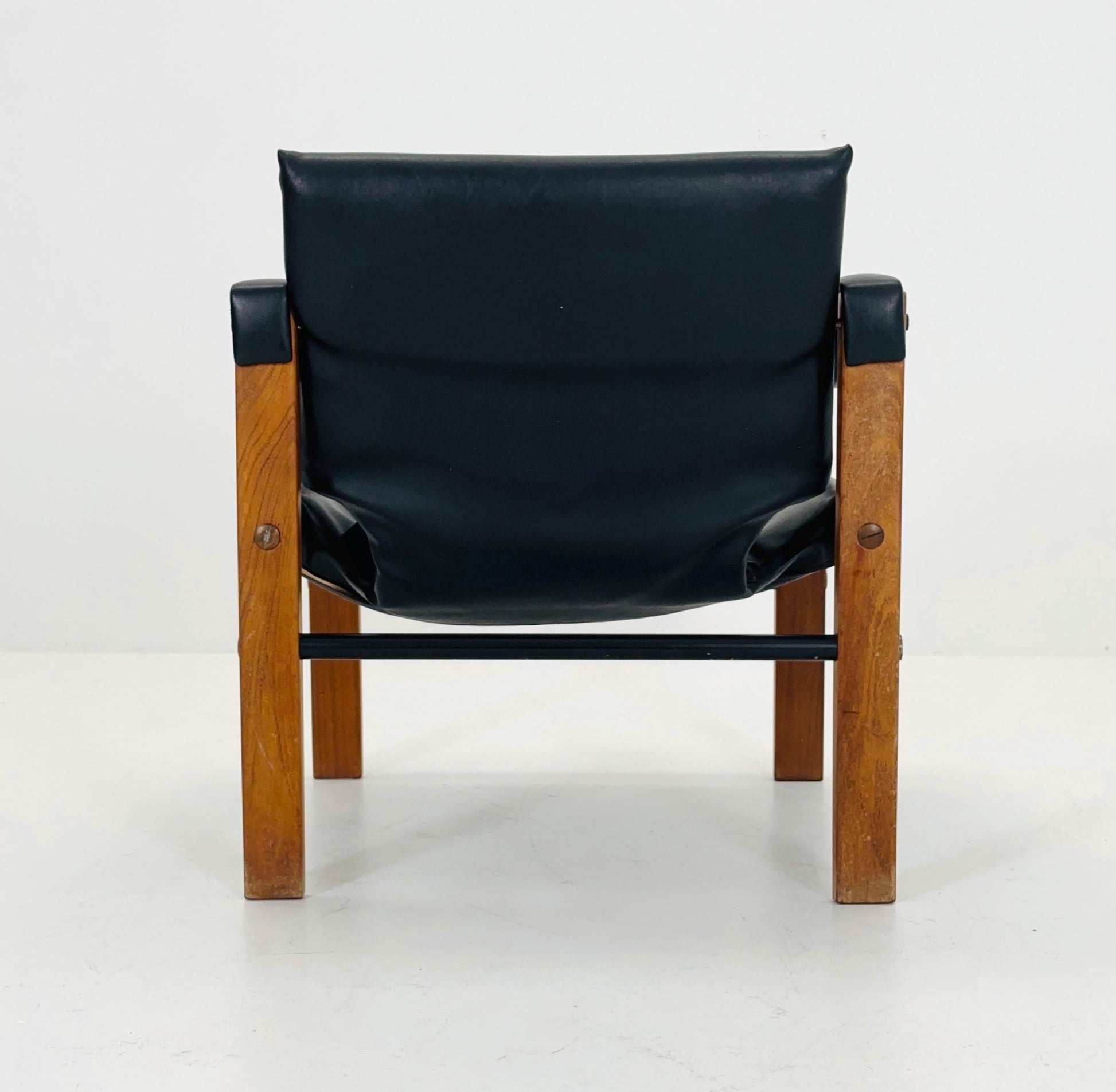 Mid century black leather Safari armchairs from Arkana by Maurice Burke, United Kingdom 1970s Scotland