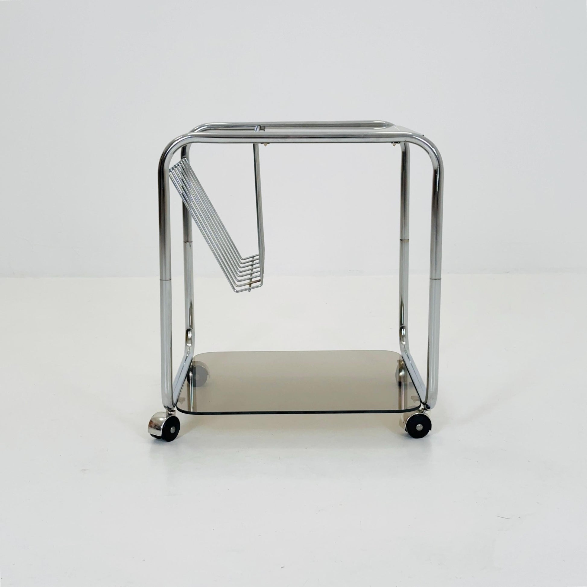 Mid century Chrome bar cart/serving trolley. magazine rack Smoked glass ,Bauhaus Germany 1980s