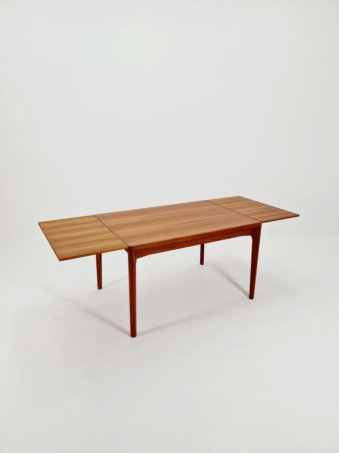 Danish Henning Kjaernulf rectangular teak table with two extension leaves, Denmark 1960s