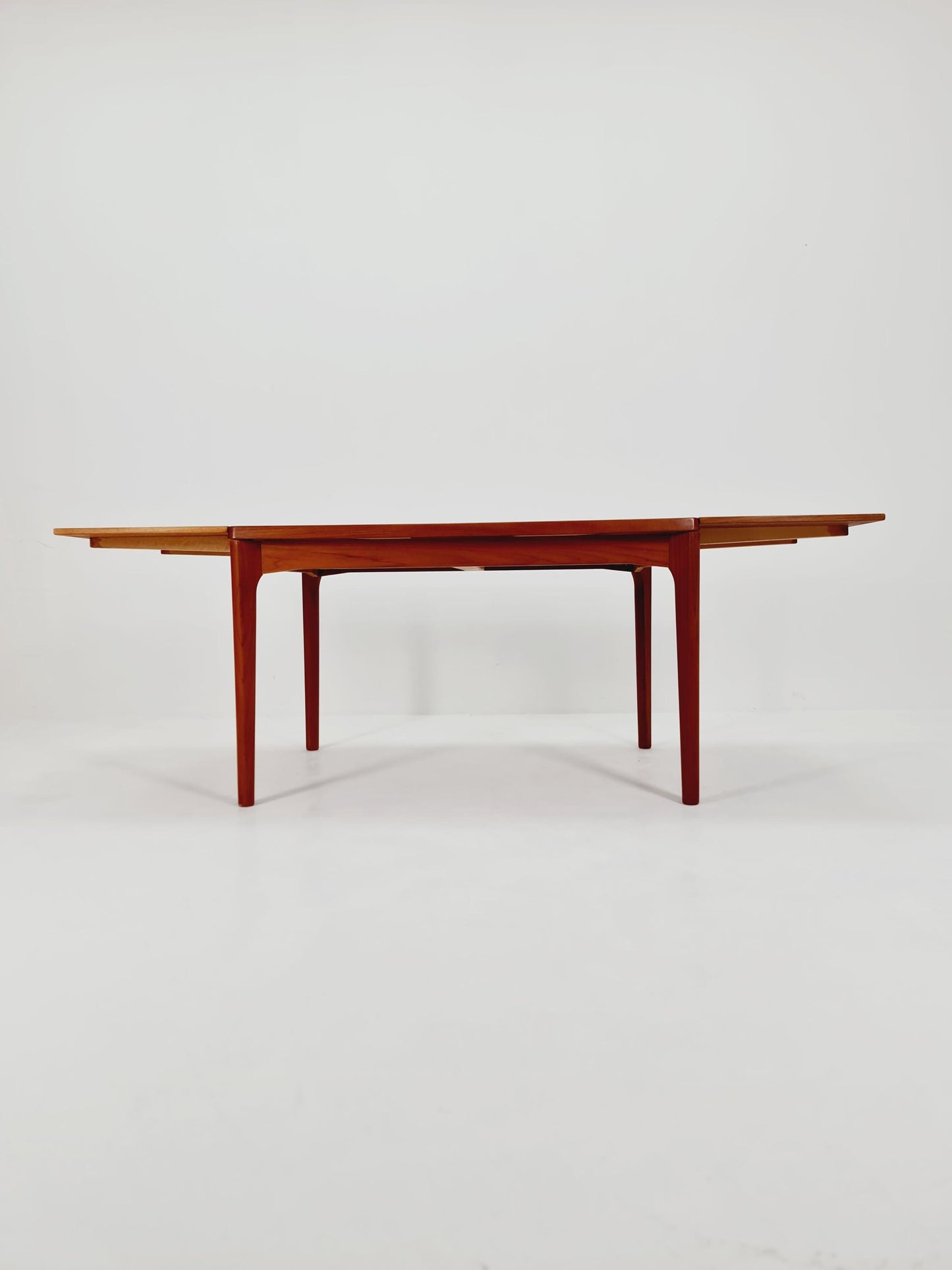 Danish Henning Kjaernulf rectangular teak table with two extension leaves, Denmark 1960s