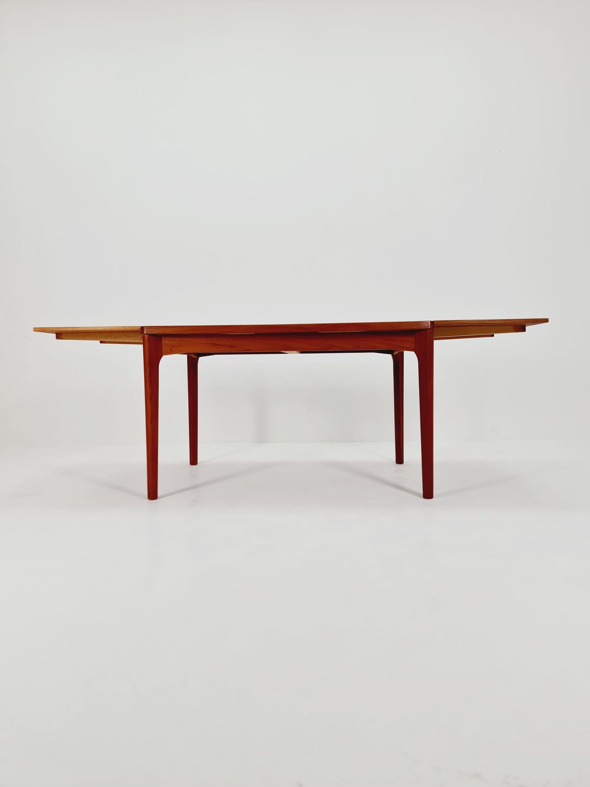 Danish Henning Kjaernulf rectangular teak table with two extension leaves, Denmark 1960s
