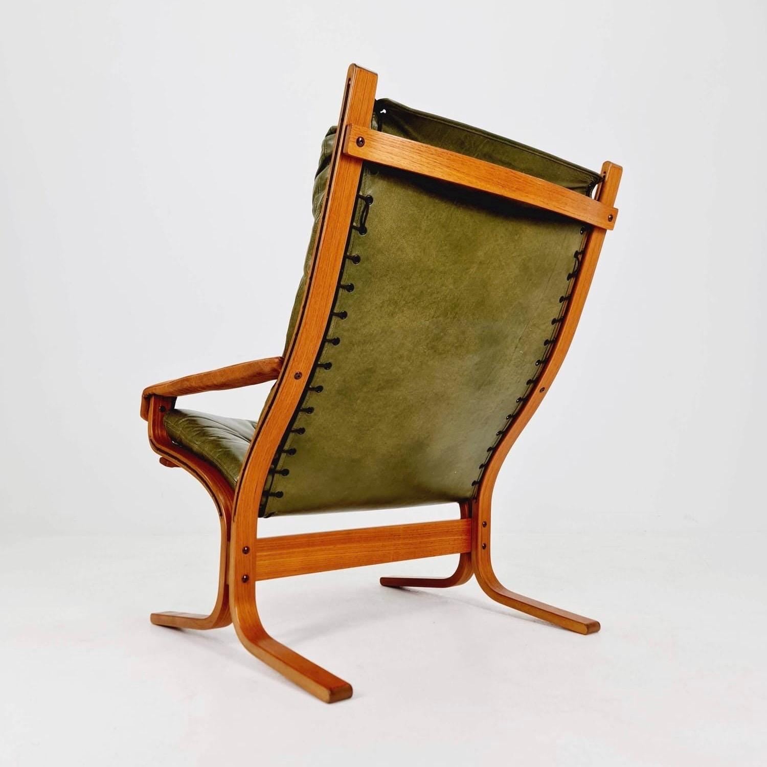 Mid century Ingmar Relling Danish Modern Siesta olive green leather Chair with High Back and Armrests from Westnofa Norway 1960s