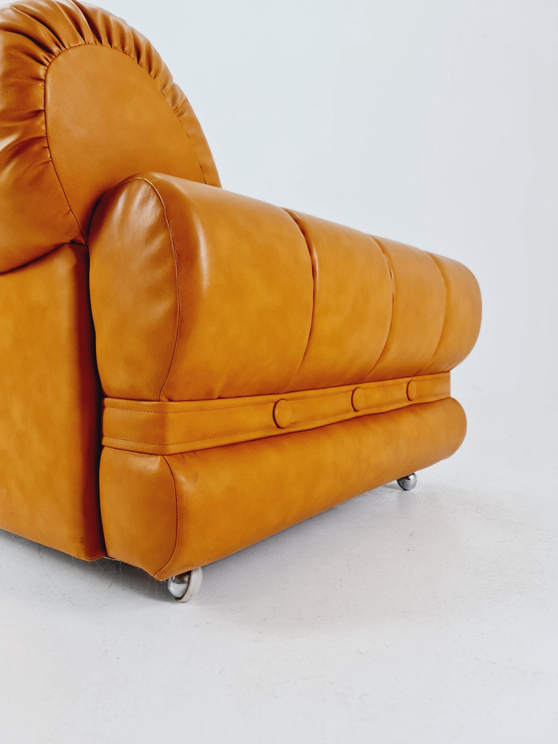 Italian space age singel lounge cognac-colored on wheels , 1970s