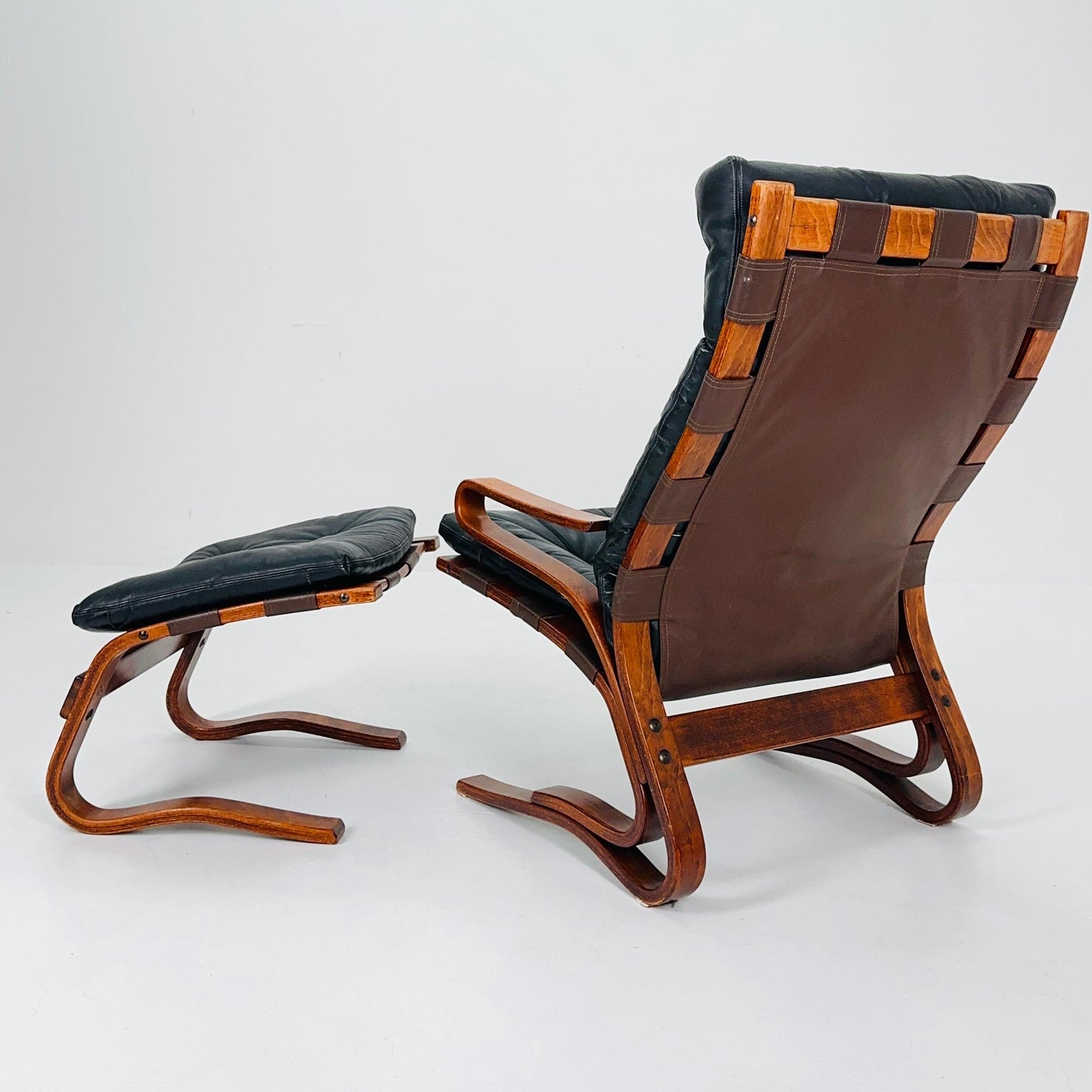 Mid century Danish black Leather Skyline Lounge chair and ottoman by Einar Hove Norway 1970s