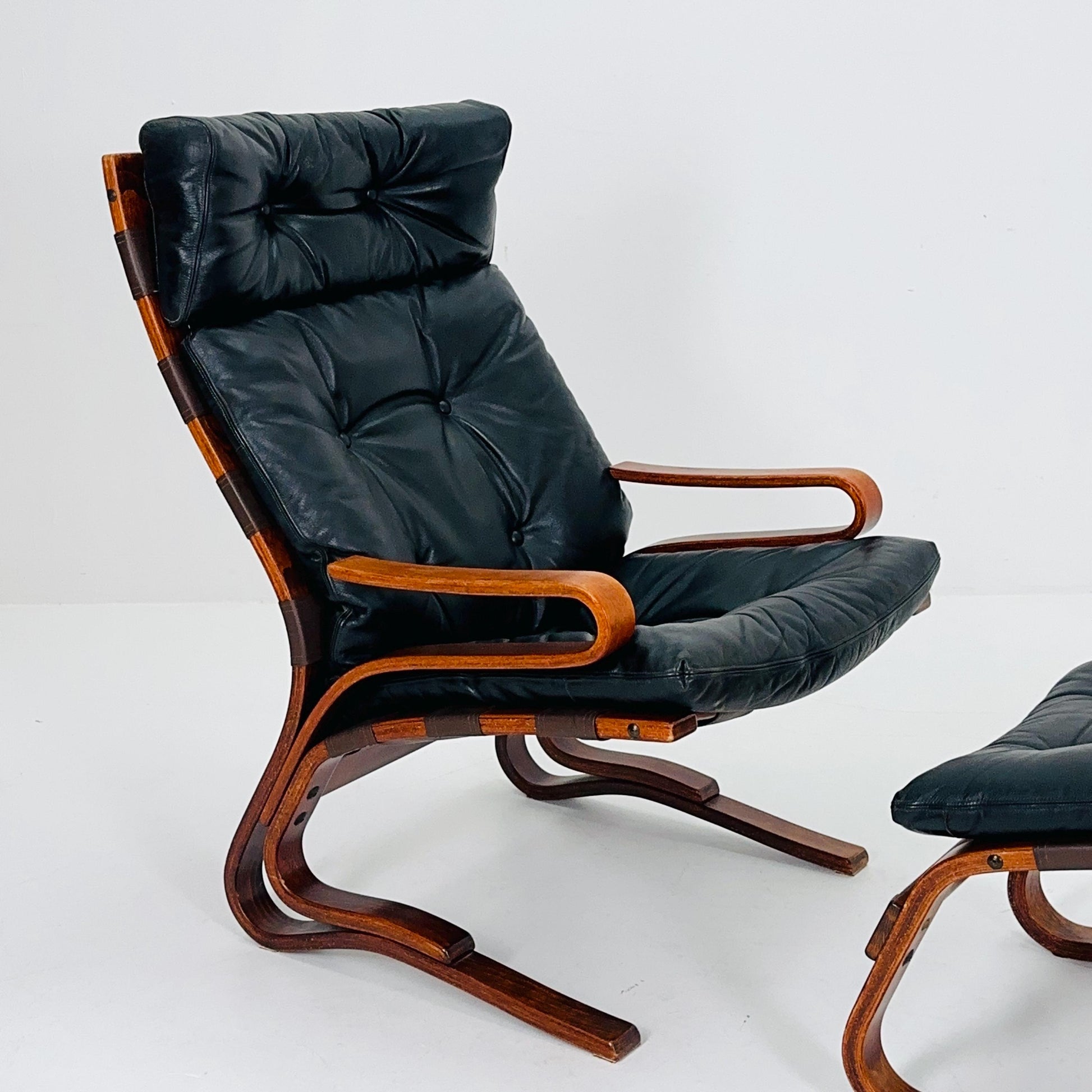 Mid century Danish black Leather Skyline Lounge chair and ottoman by Einar Hove Norway 1970s