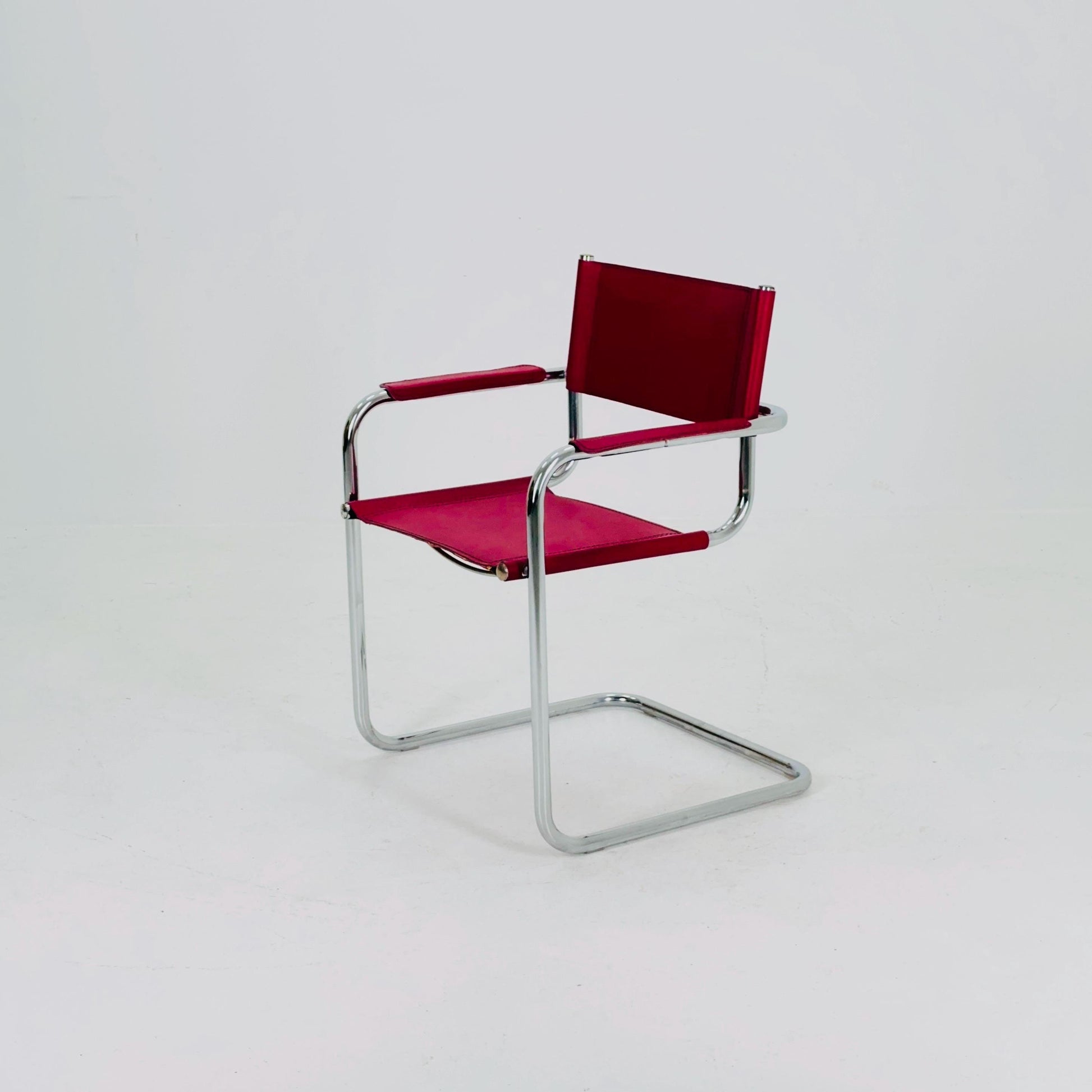 Mid Century iconic Mart Stam S34 armchair / Bauhaus chrome tube steel and burgundy faux leather / 80s vintage cantilever chair italy