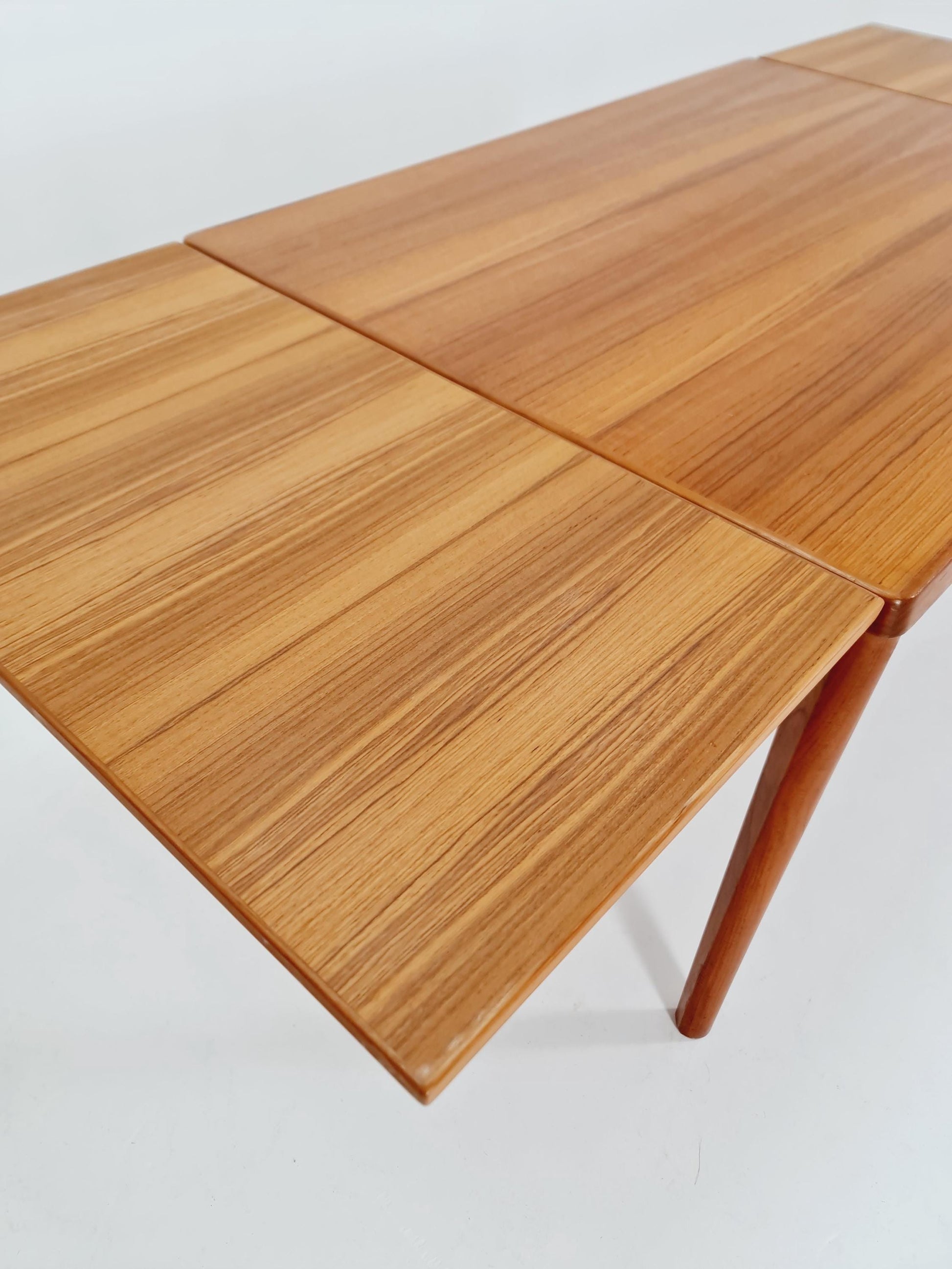 Danish Henning Kjaernulf rectangular teak table with two extension leaves, Denmark 1960s
