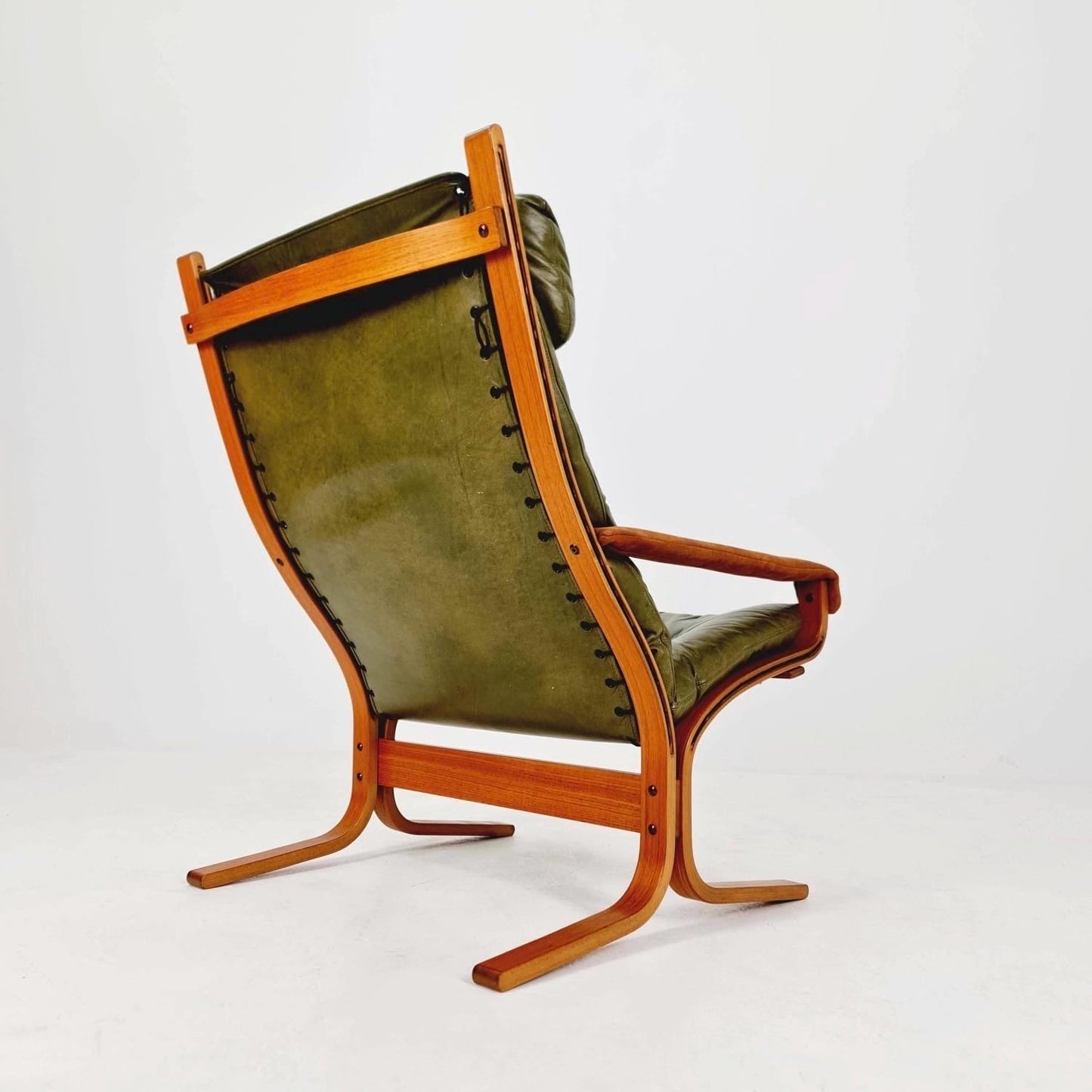 Mid century Ingmar Relling Danish Modern Siesta olive green leather Chair with High Back and Armrests from Westnofa Norway 1960s