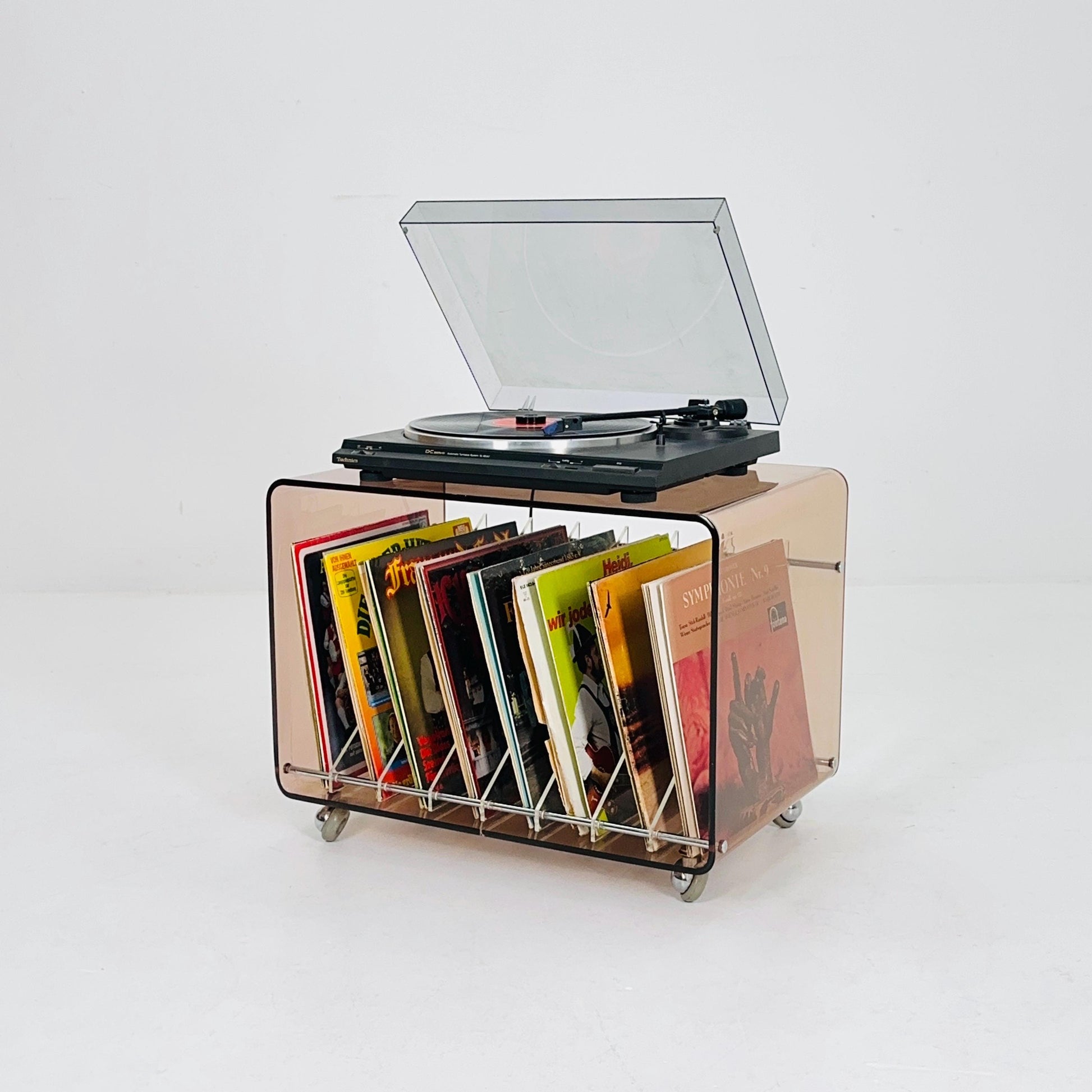Space age Smoked Brown Plexiglass vinyl storage /Trolley by Michel Dumas for Roche Bobois 1970s