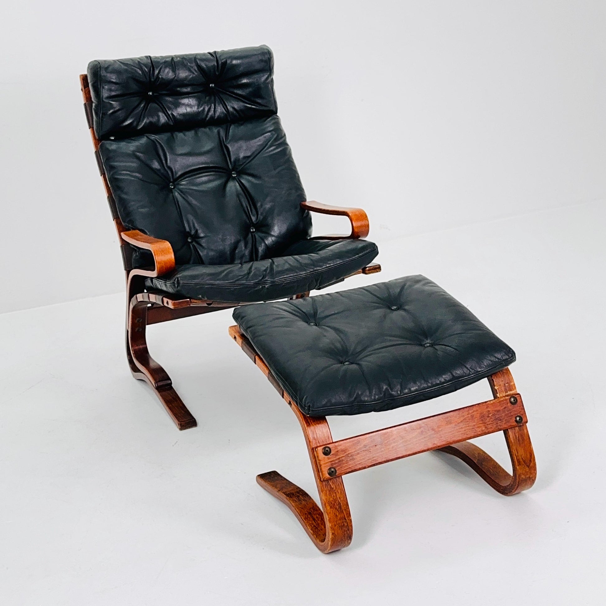 Mid century Danish black Leather Skyline Lounge chair and ottoman by Einar Hove Norway 1970s