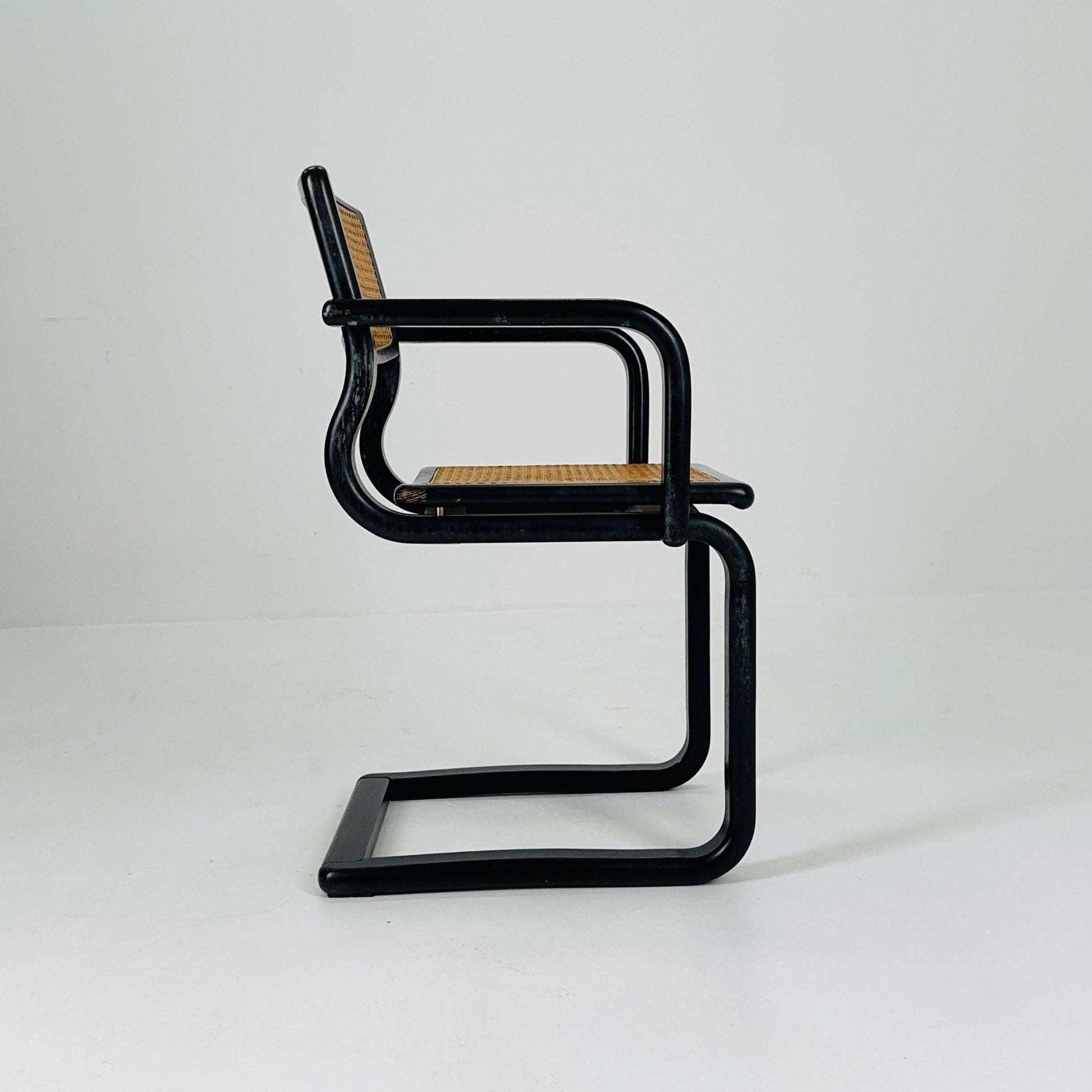 Mid century black wooden cantilever armchair, by Lubke Germany 1970s