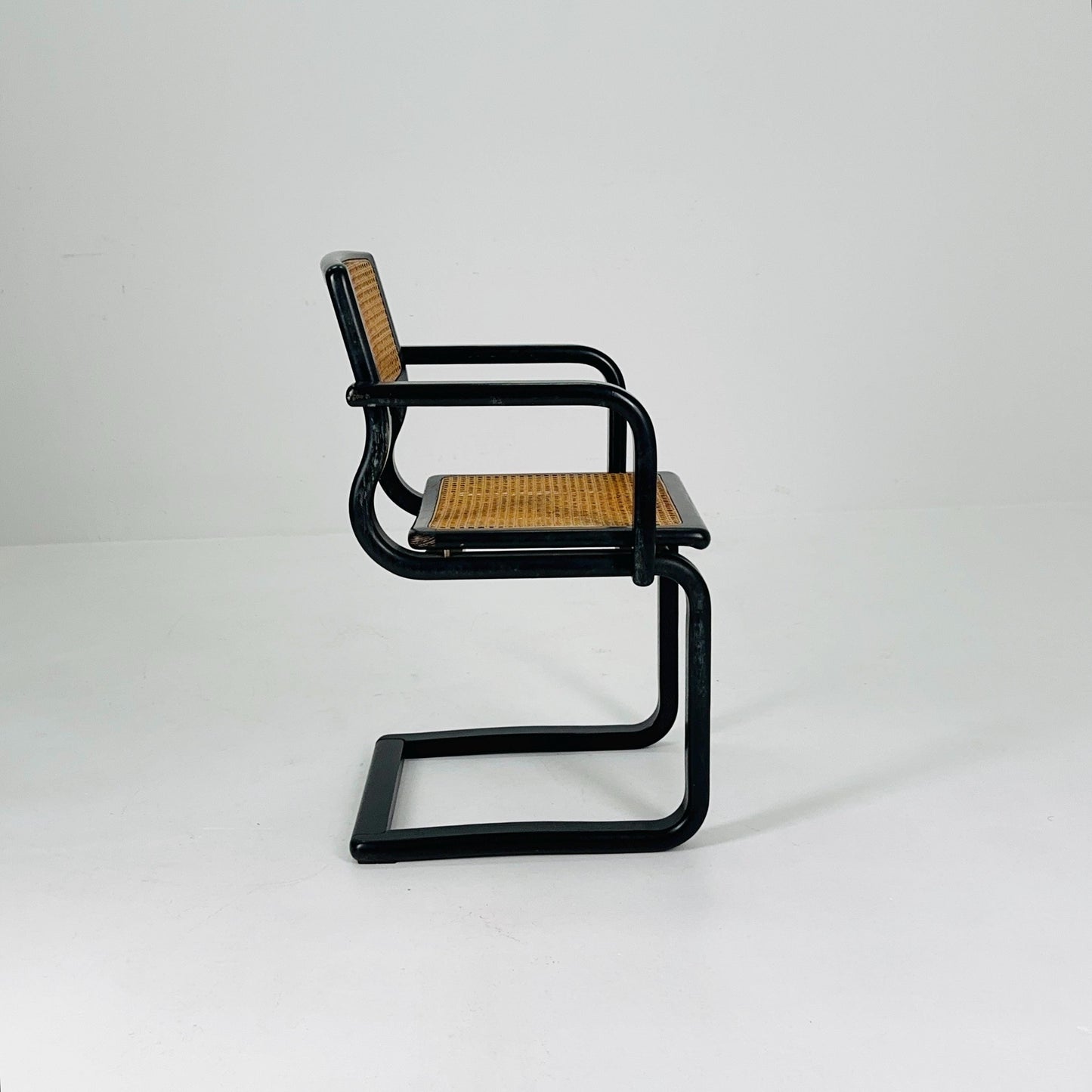 Mid century black wooden cantilever armchair, by Lubke Germany 1970s