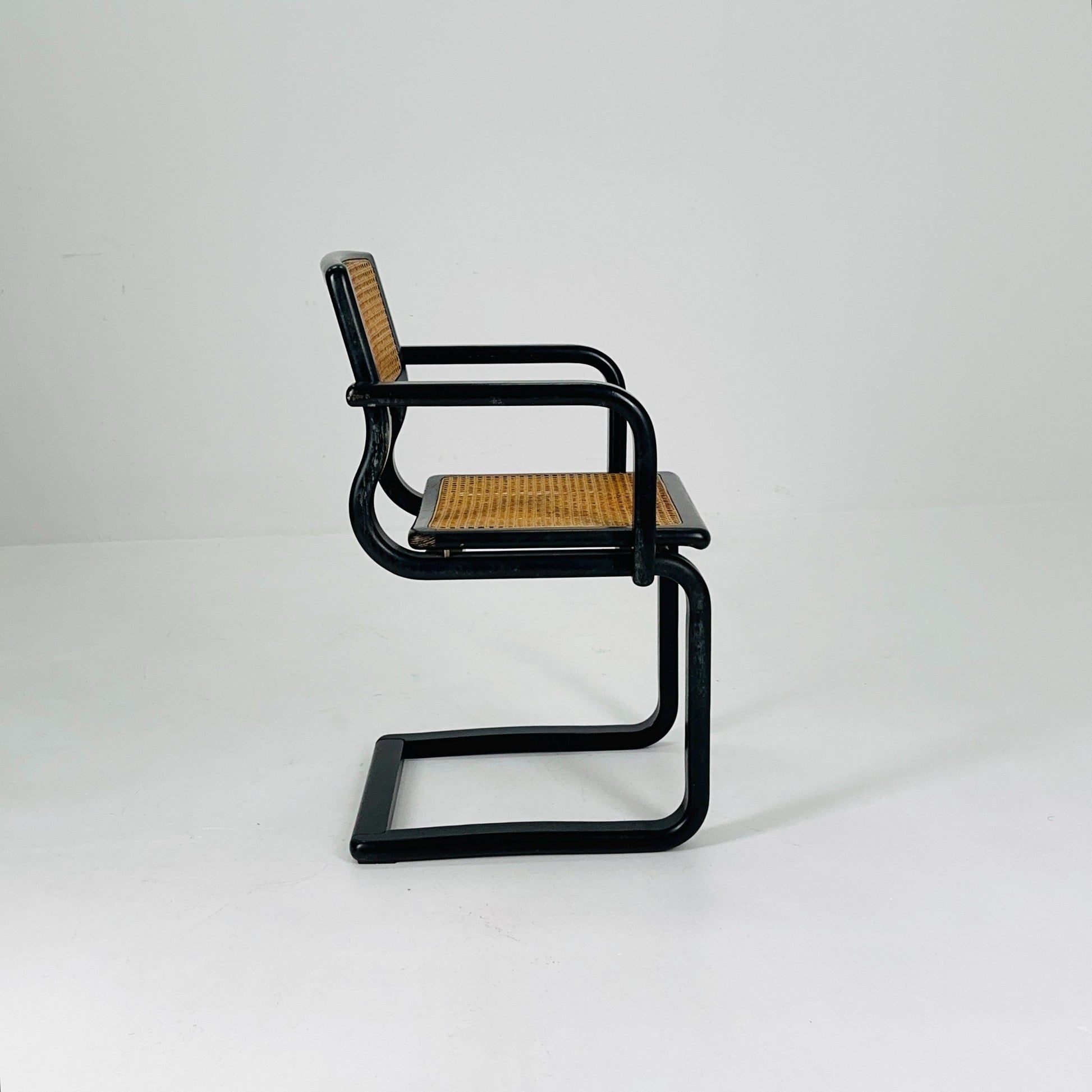 Mid century black wooden cantilever armchair, by Lubke Germany 1970s