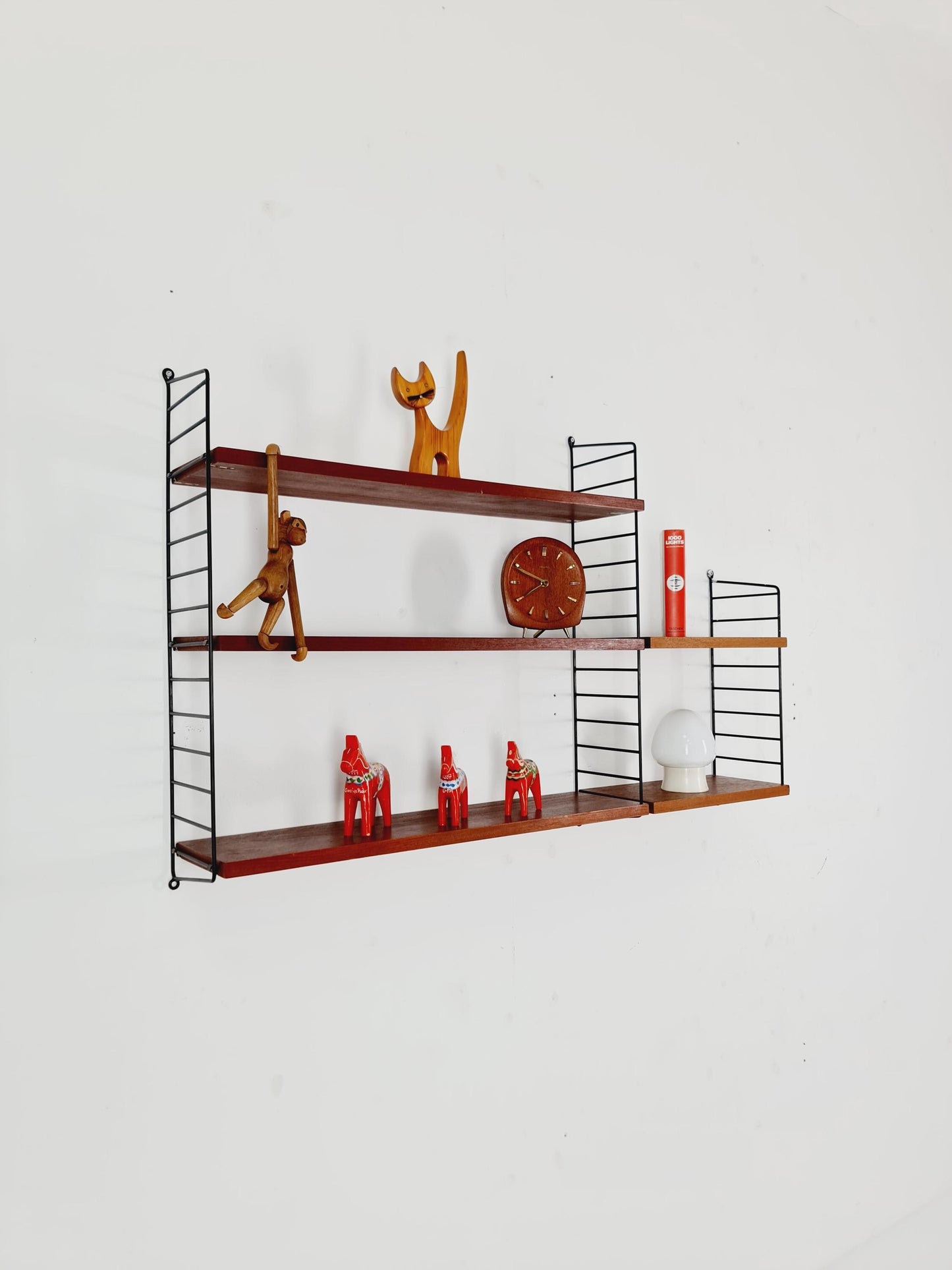 Original MCM Teak shelving system - consists of black lacquered metal ladders, from string Stockholm 1960s