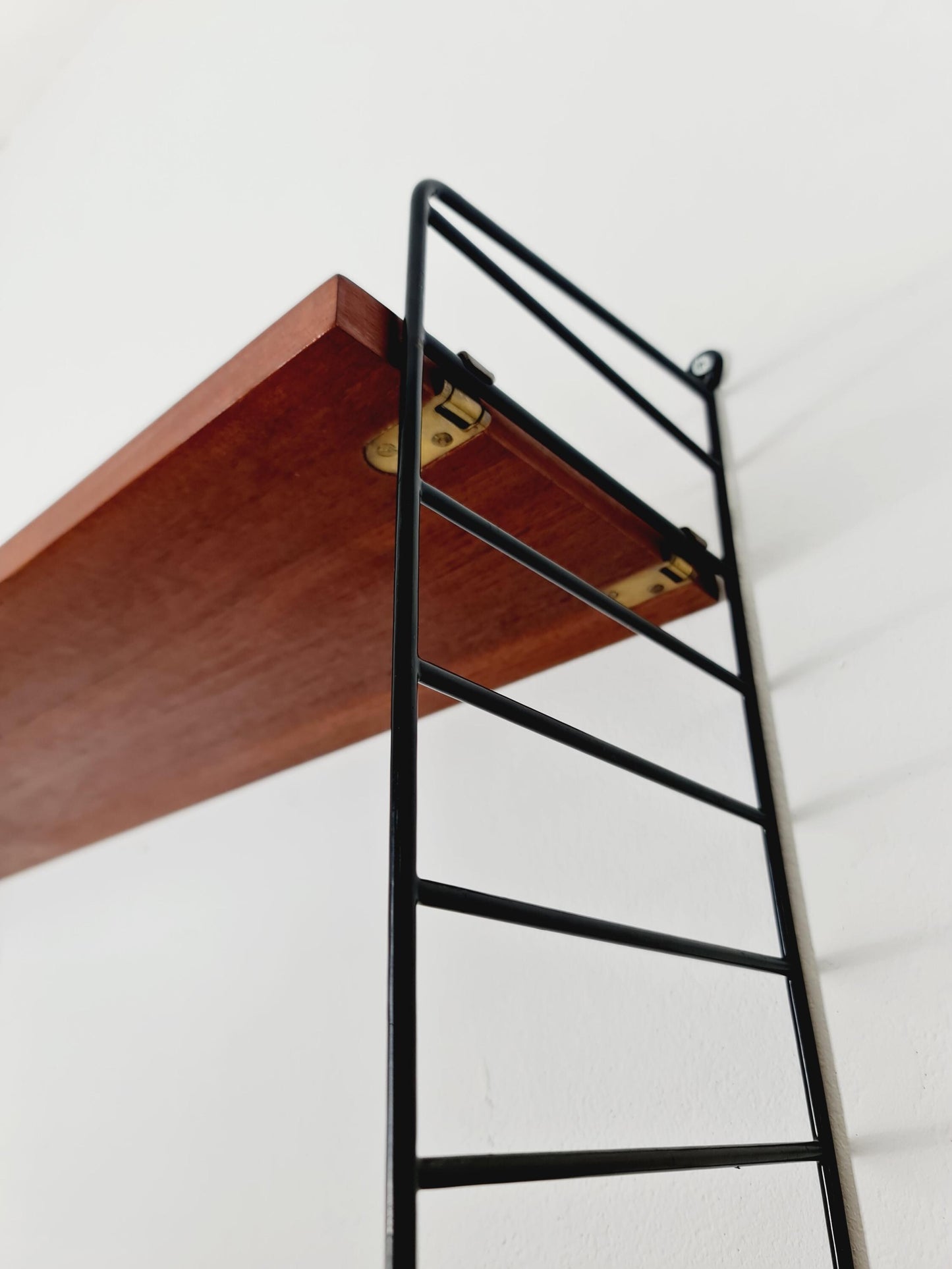 Original MCM Teak shelving system - consists of Black lacquered metal ladders, from string Stockholm 1960s