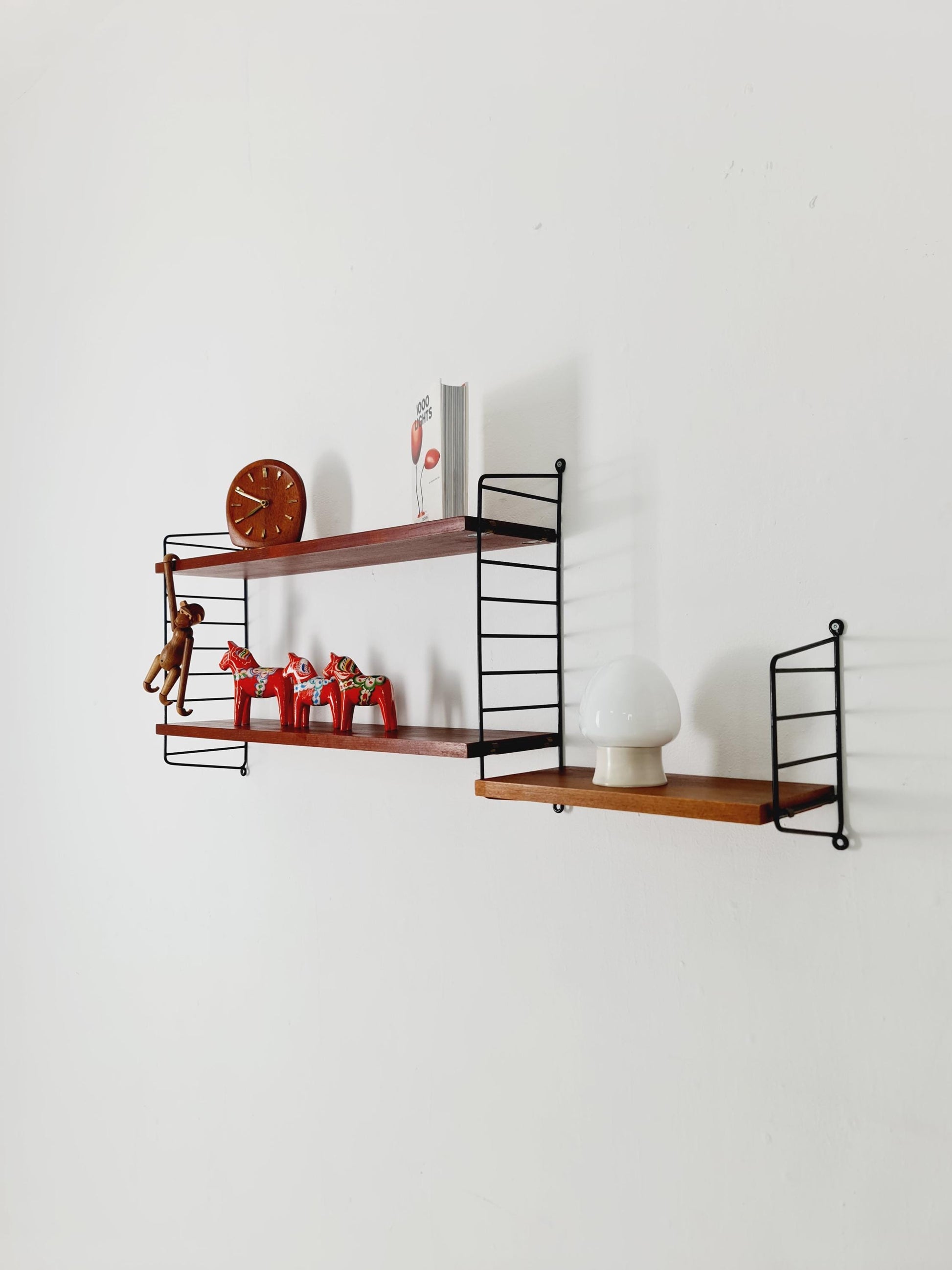 Original MCM Teak shelving system - consists of Black lacquered metal ladders, from string Stockholm 1960s