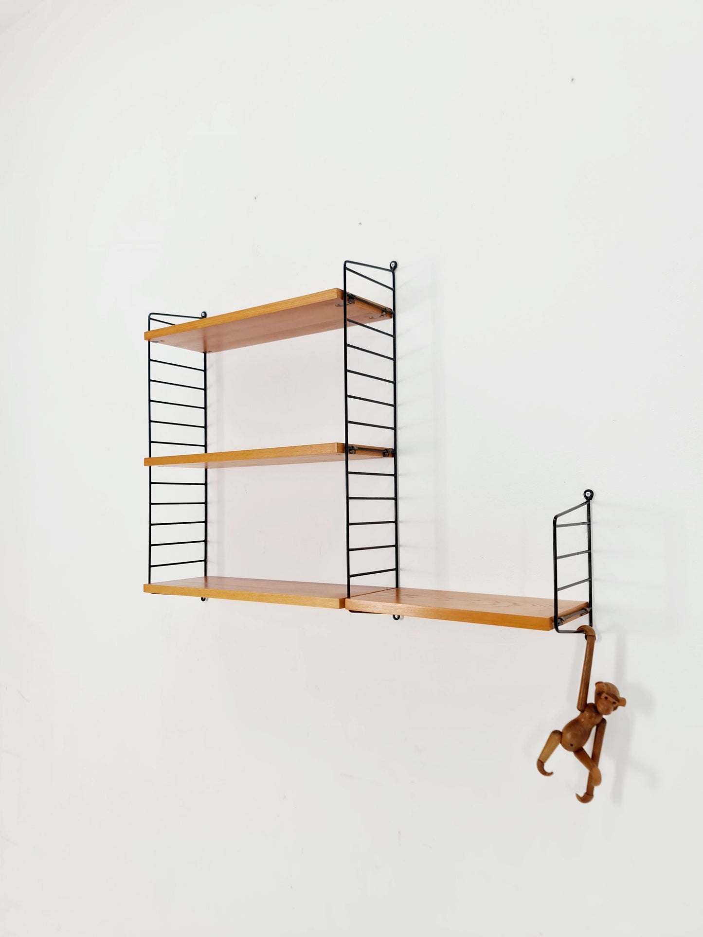 Original MCM Teak shelving system - consists of Black lacquered metal ladders, from string Stockholm 1960s