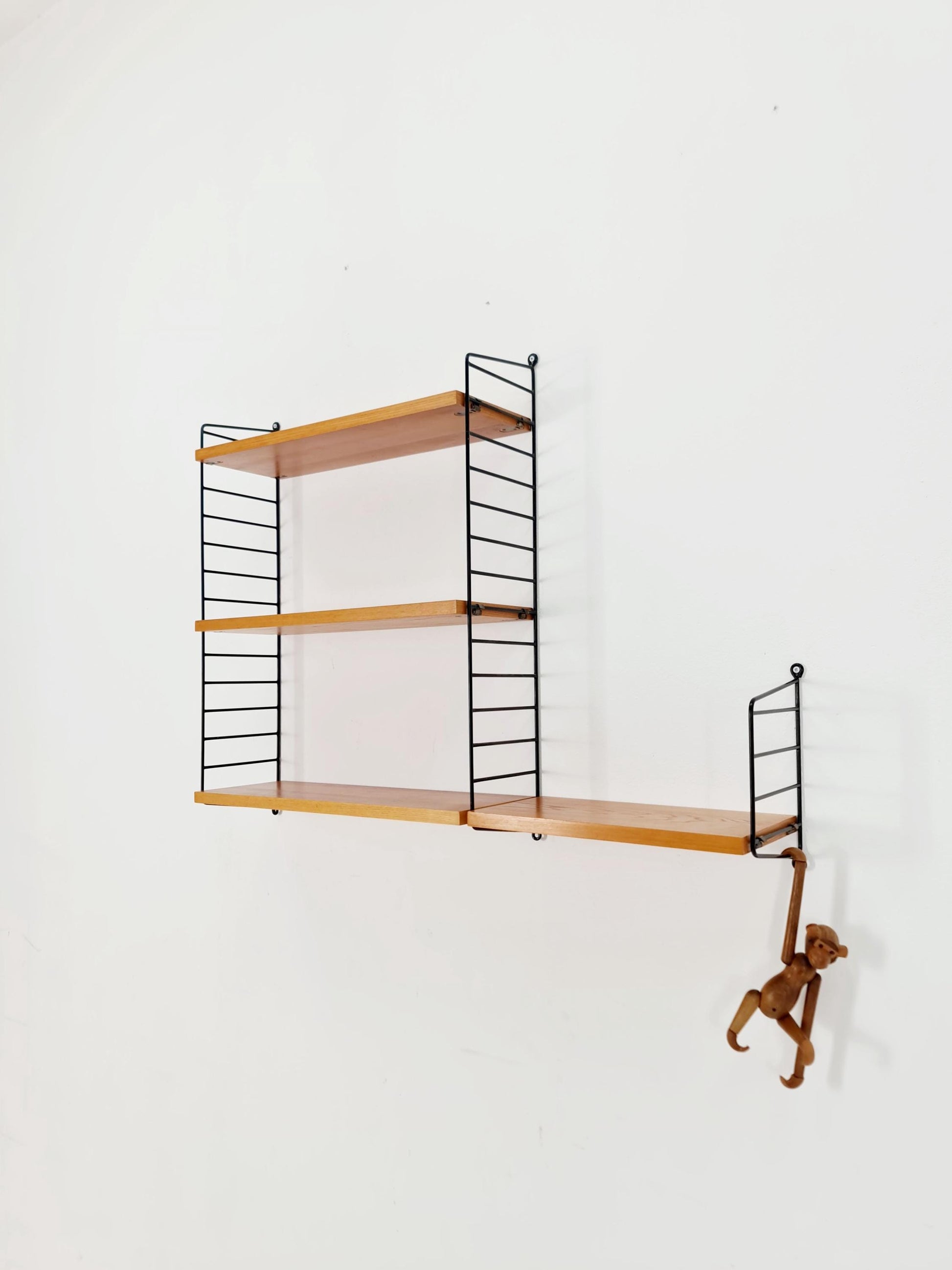 Original MCM Teak shelving system - consists of Black lacquered metal ladders, from string Stockholm 1960s