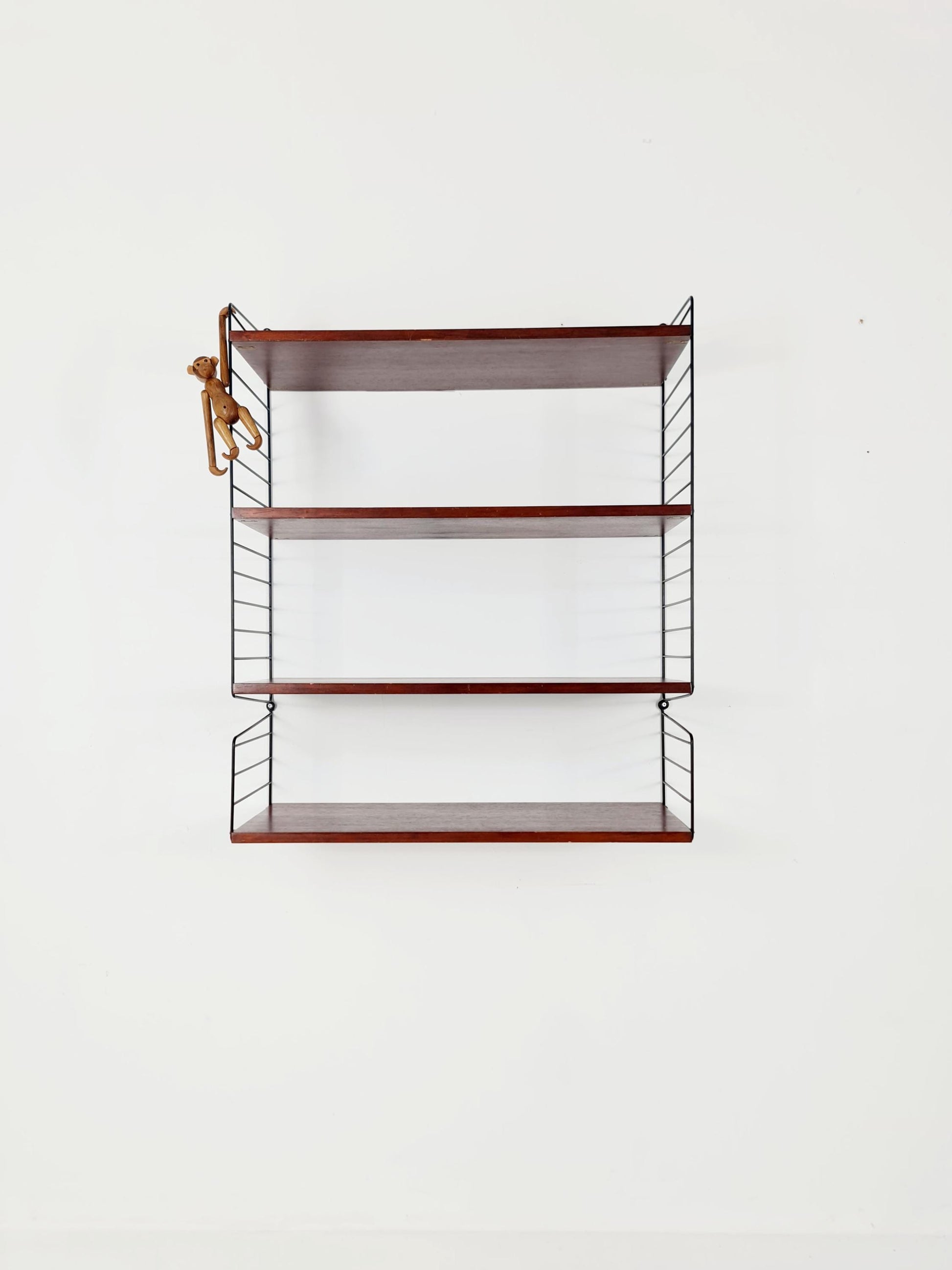 Original MCM Teak shelving system - consists of black lacquered metal ladders, from string Stockholm 1960s