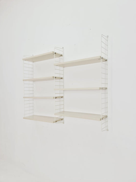 Original MCM wood shelving system - consists of black lacquered metal ladders, from string Stockholm 1960s