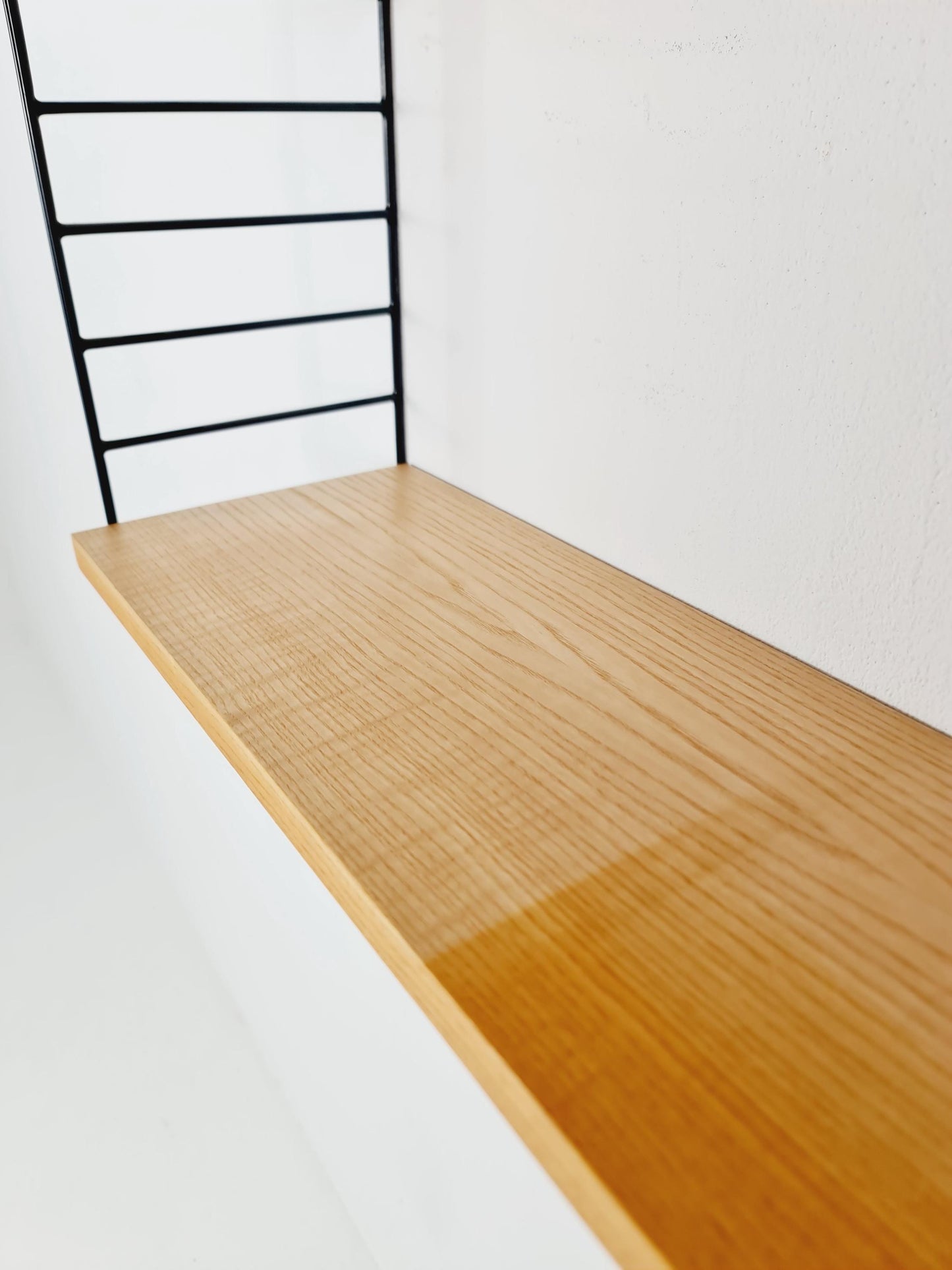 Original MCM Ash shelving system - consists of Black lacquered metal ladders, from string Stockholm 1960s