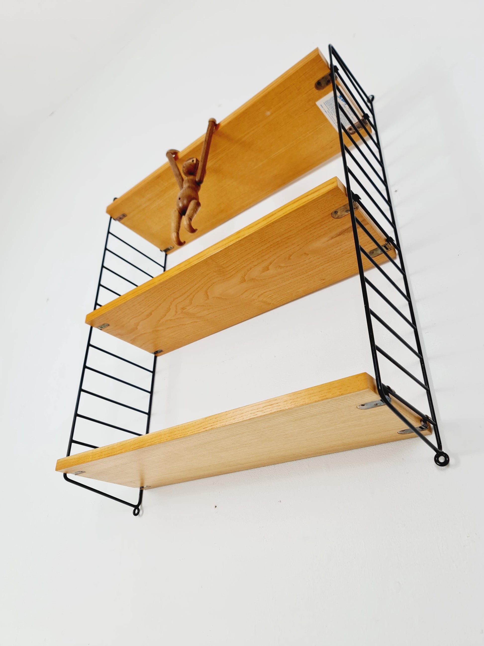 Original MCM Ash shelving system - consists of Black lacquered metal ladders, from string Stockholm 1960s