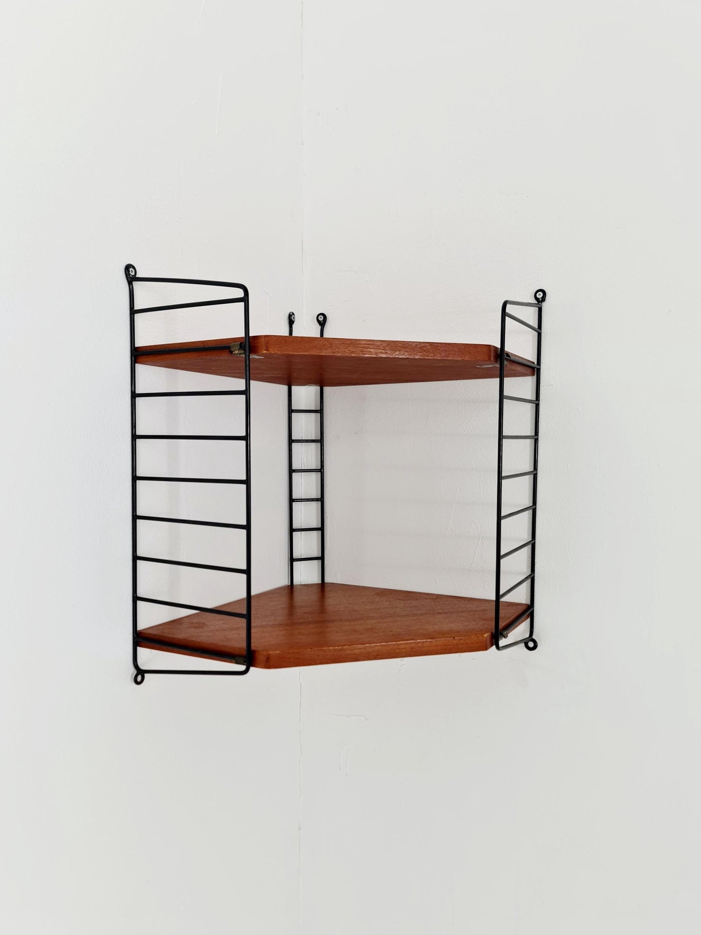 Original MCM Teak Corner shelving system - consists of Black lacquered metal ladders, from string Stockholm 1960s