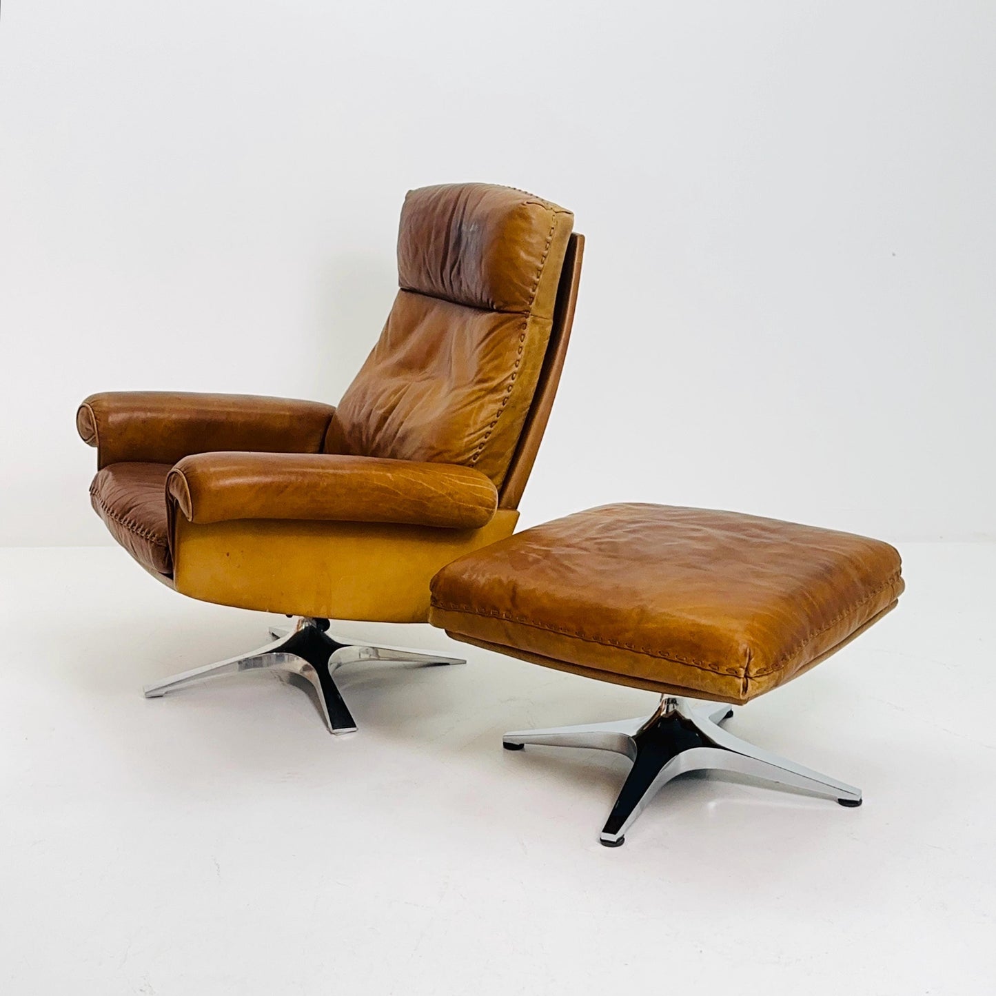 Mid Century De Sede DS31 high back armchair and Ottoman in cognac leather Switzerland 1970s