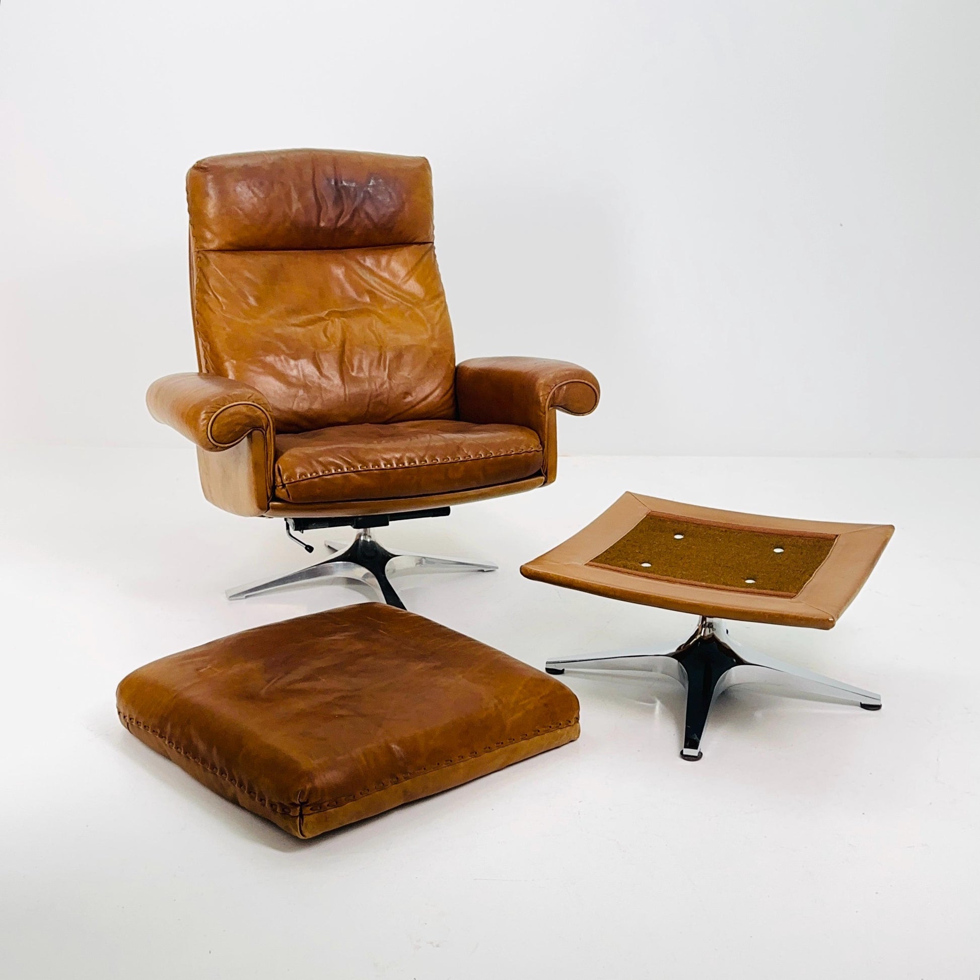 Mid Century De Sede DS31 high back armchair and Ottoman in cognac leather Switzerland 1970s