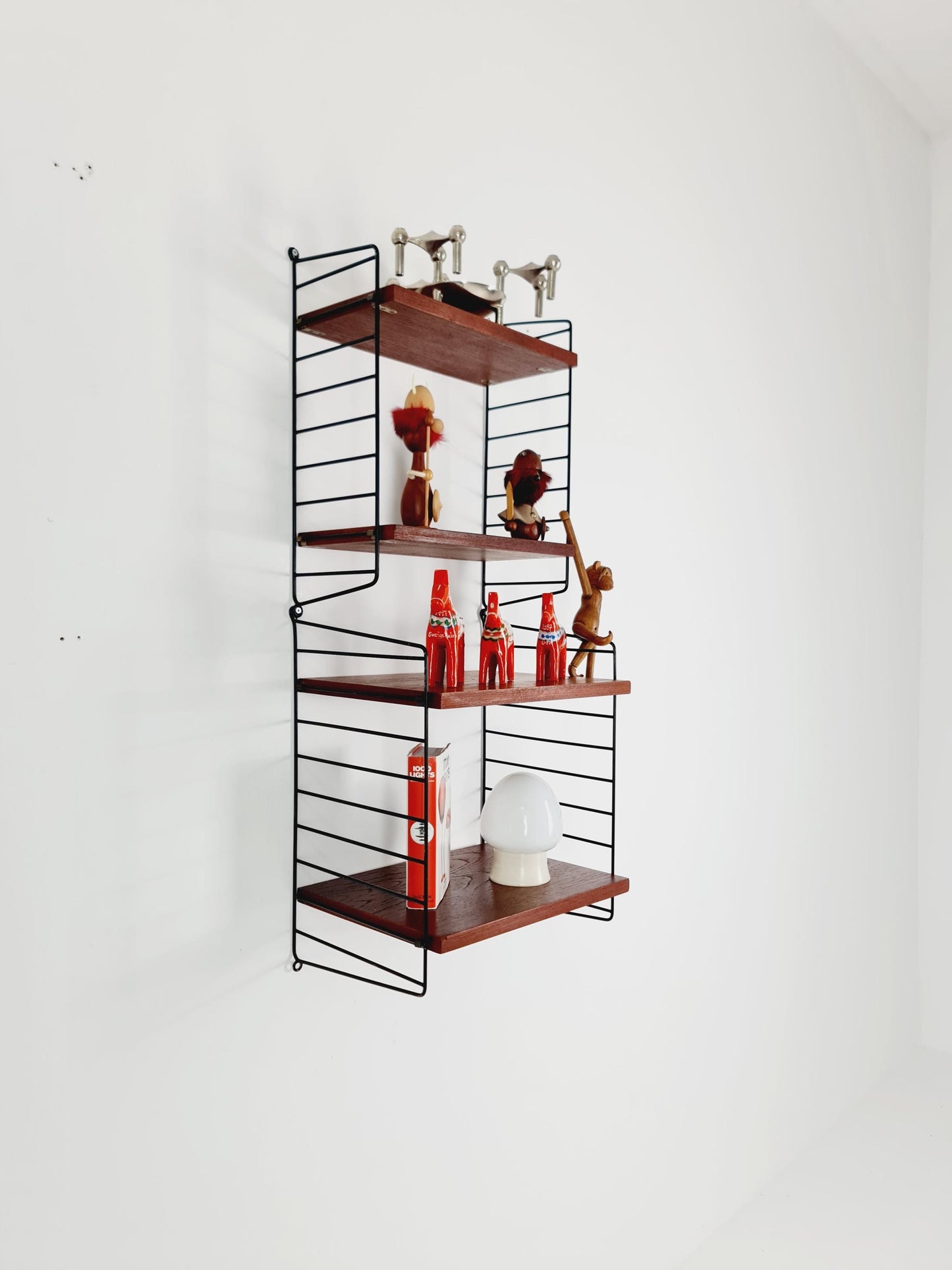 Original MCM Teak shelving system - consists of Black lacquered metal ladders, from string Stockholm 1960s