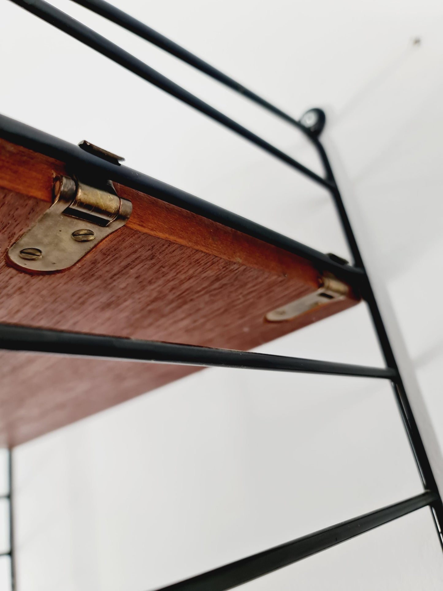 Original MCM Teak shelving system - consists of Black lacquered metal ladders, from string Stockholm 1960s