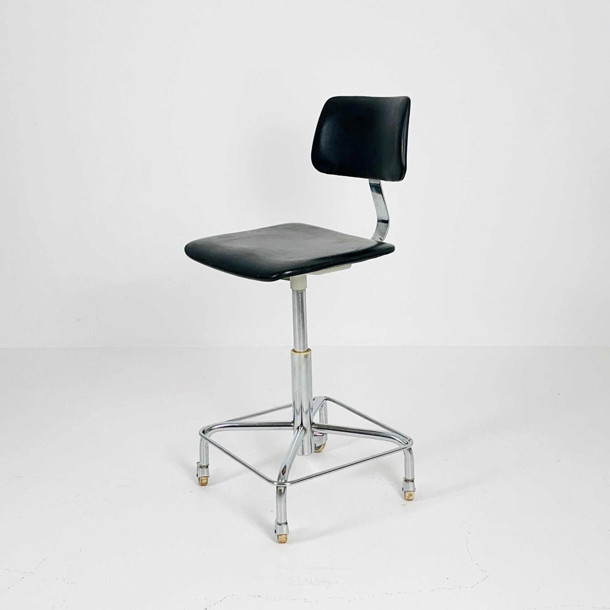 Mid century black faux leather swivel desk chair 1960s Germany