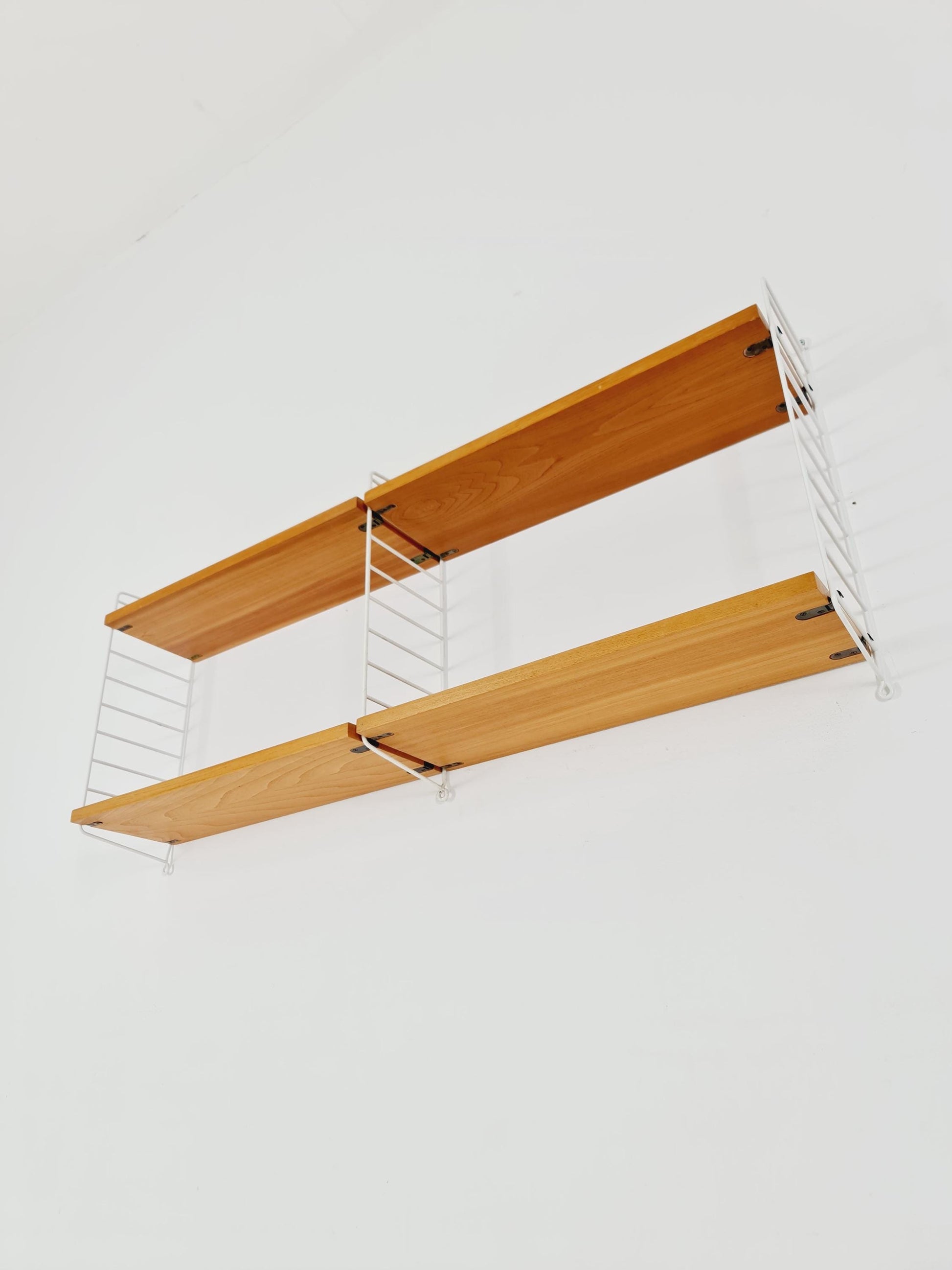 Original MCM Ash shelving system - consists of Black lacquered metal ladders, from string Stockholm 1960s