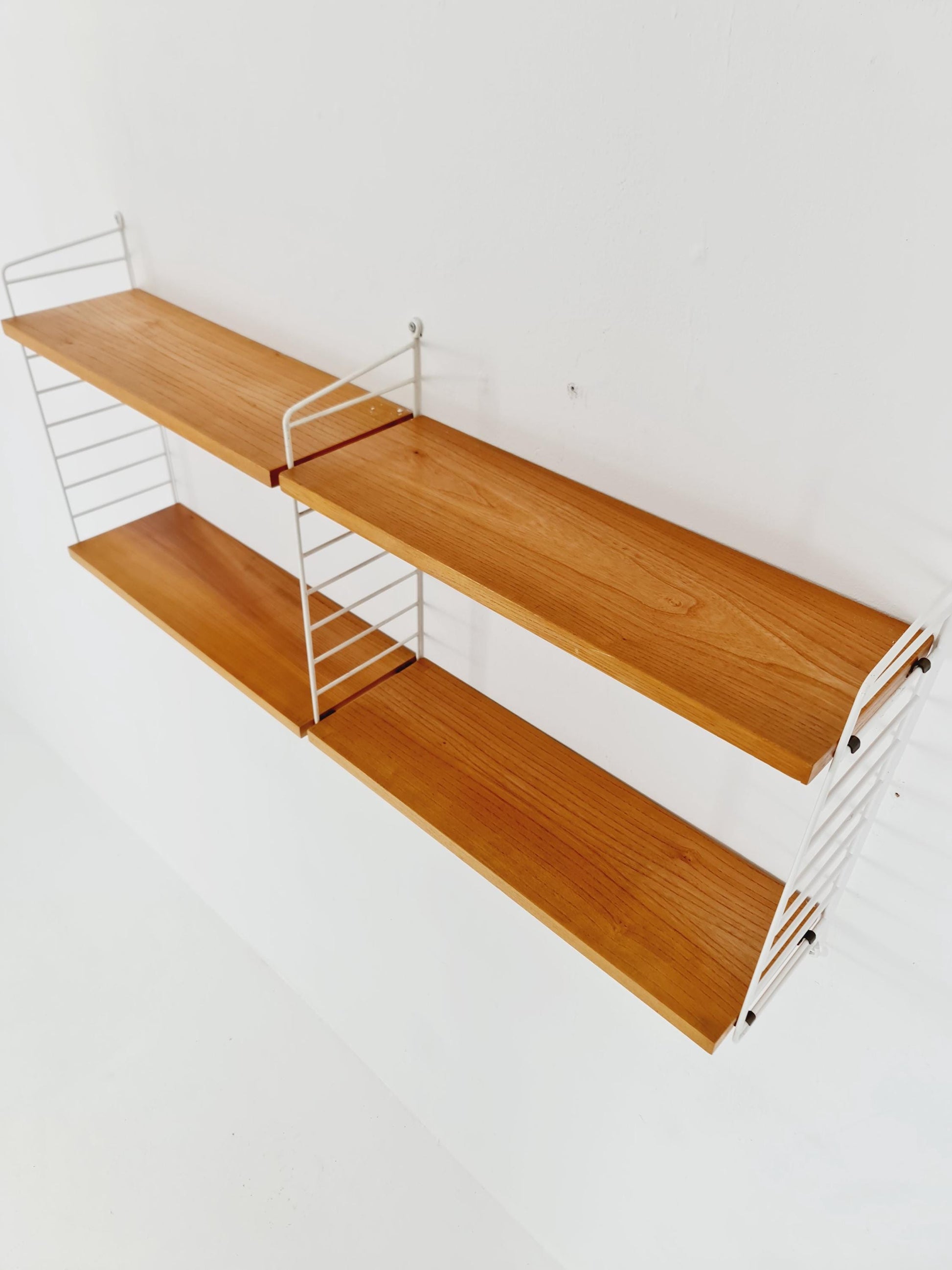 Original MCM Ash shelving system - consists of Black lacquered metal ladders, from string Stockholm 1960s