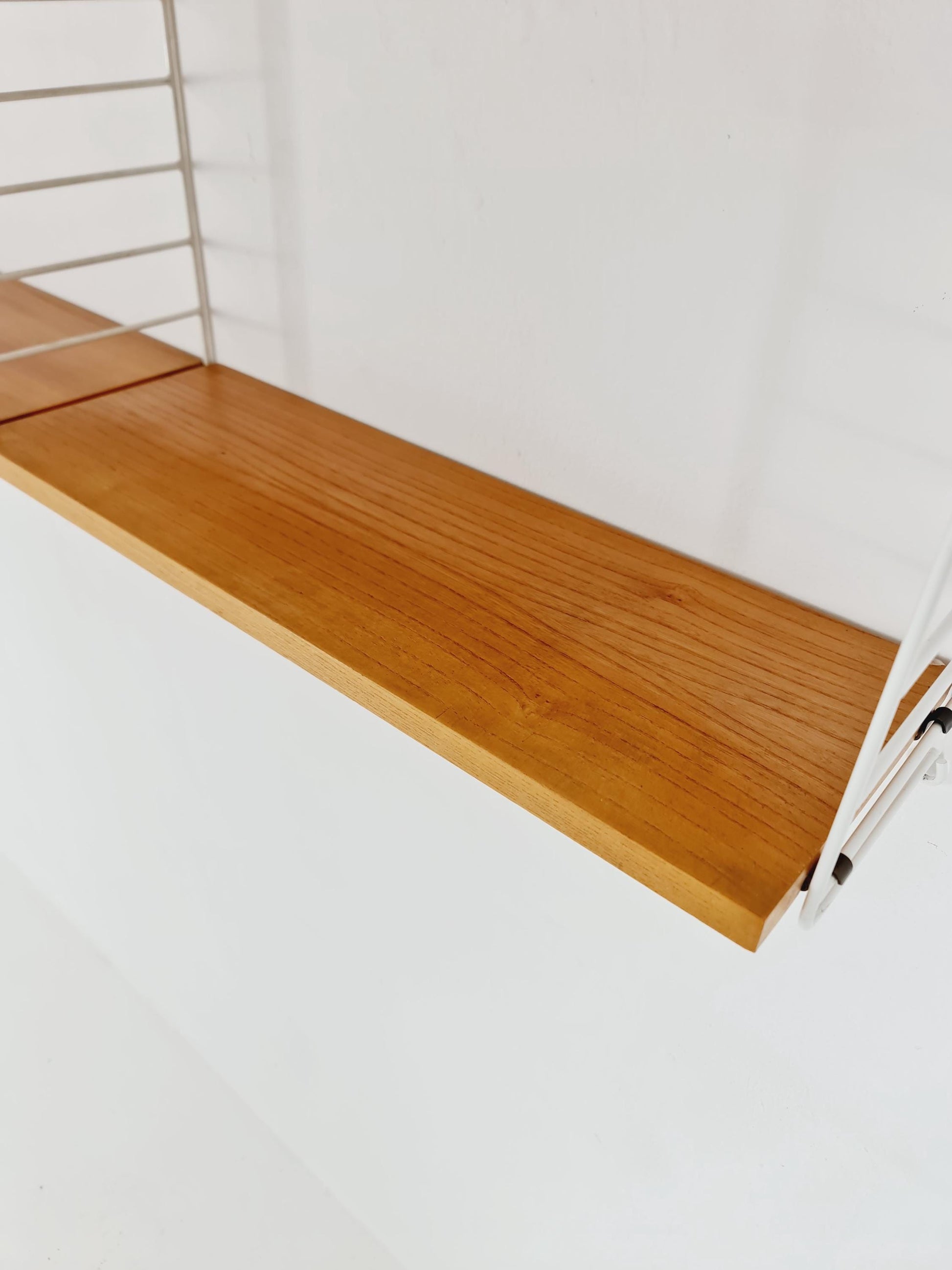 Original MCM Ash shelving system - consists of Black lacquered metal ladders, from string Stockholm 1960s