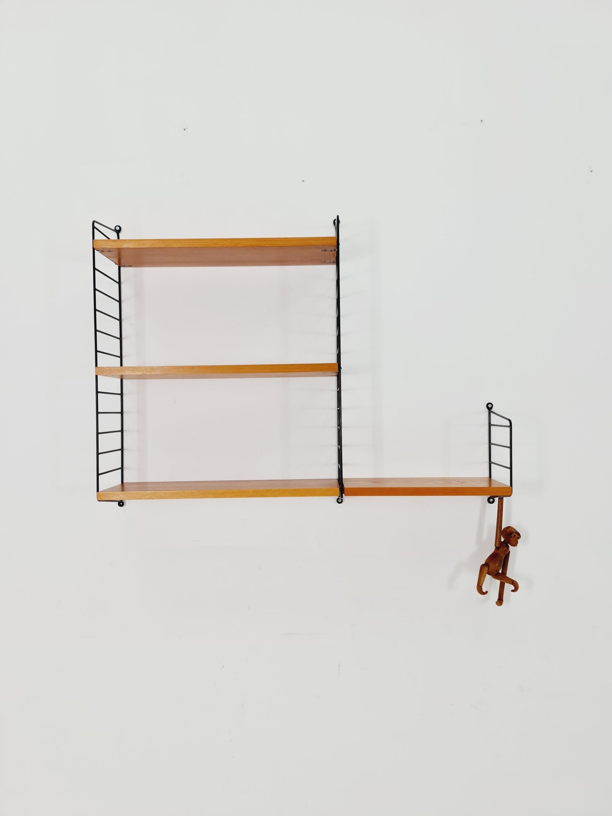 Original MCM Teak shelving system - consists of Black lacquered metal ladders, from string Stockholm 1960s