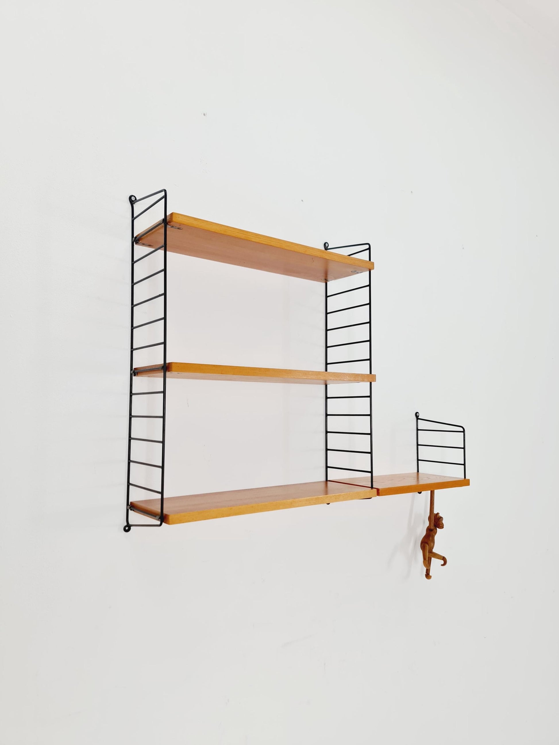 Original MCM Teak shelving system - consists of Black lacquered metal ladders, from string Stockholm 1960s