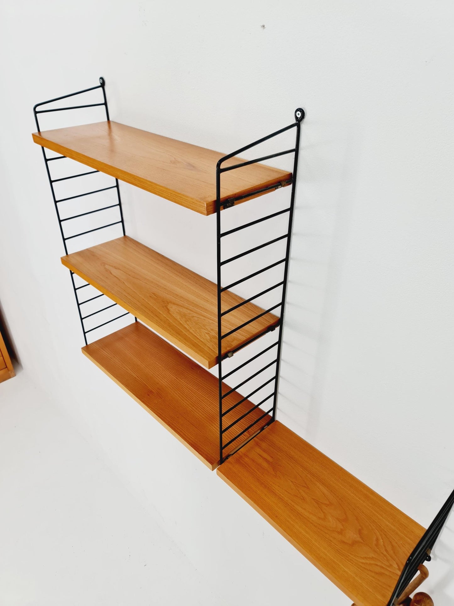 Original MCM Teak shelving system - consists of Black lacquered metal ladders, from string Stockholm 1960s