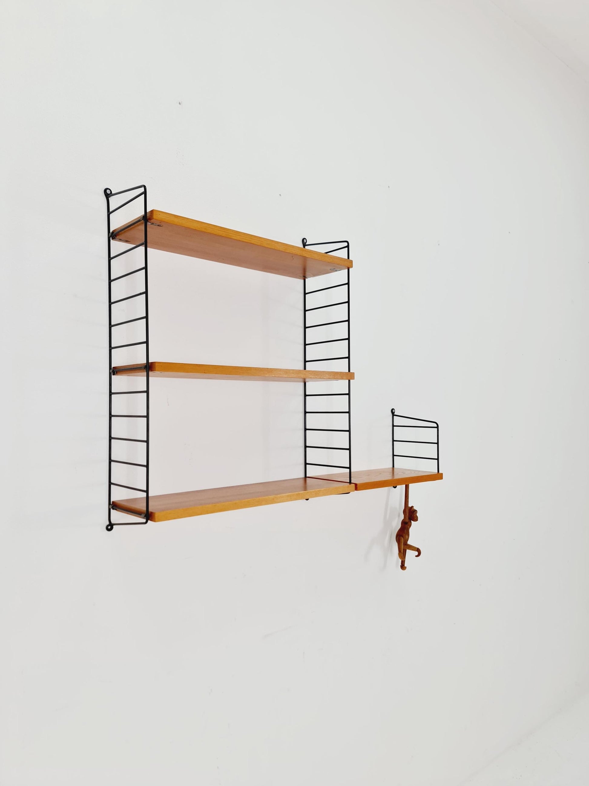 Original MCM Teak shelving system - consists of Black lacquered metal ladders, from string Stockholm 1960s