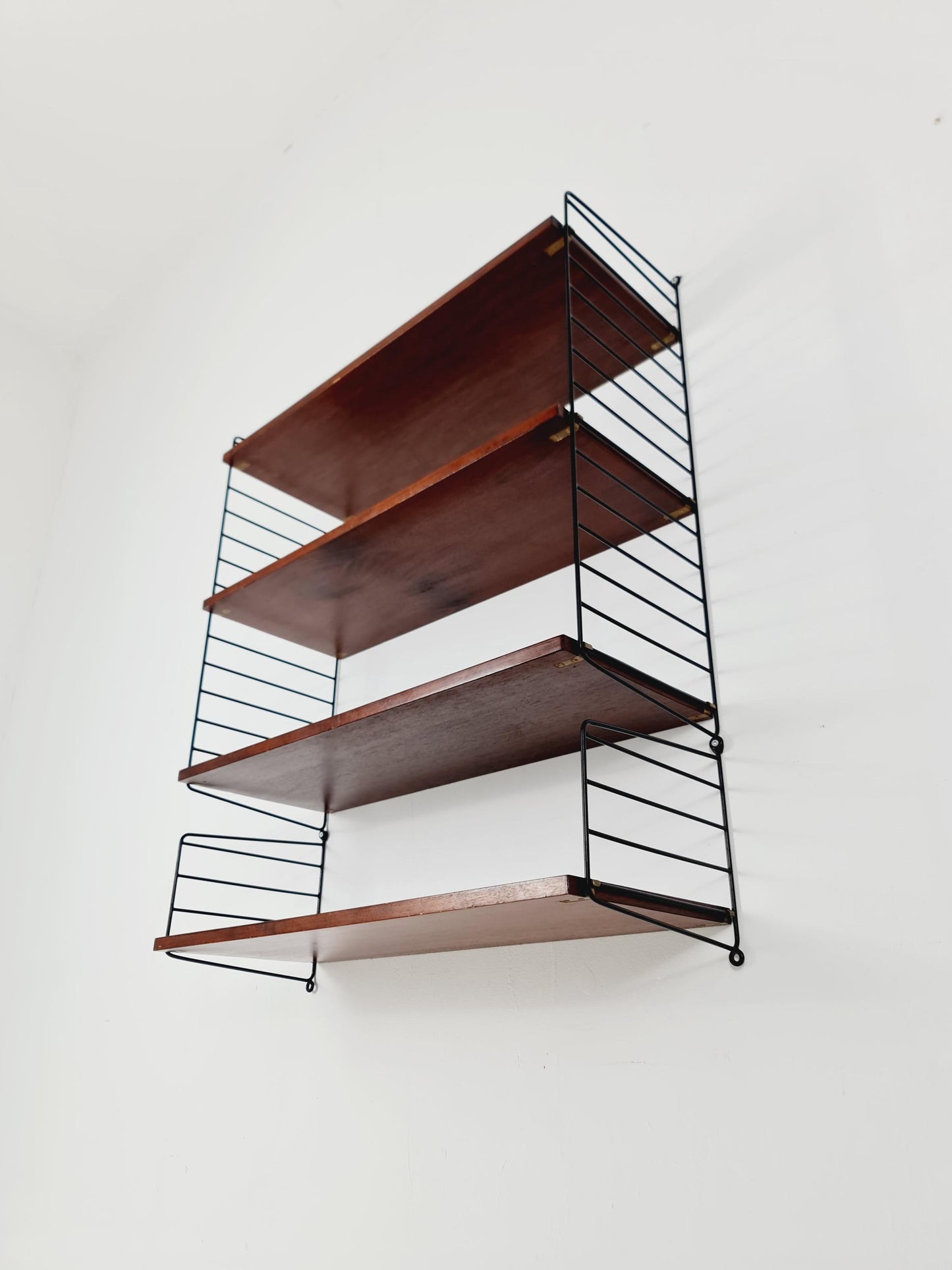 Original MCM Teak shelving system - consists of black lacquered metal ladders, from string Stockholm 1960s