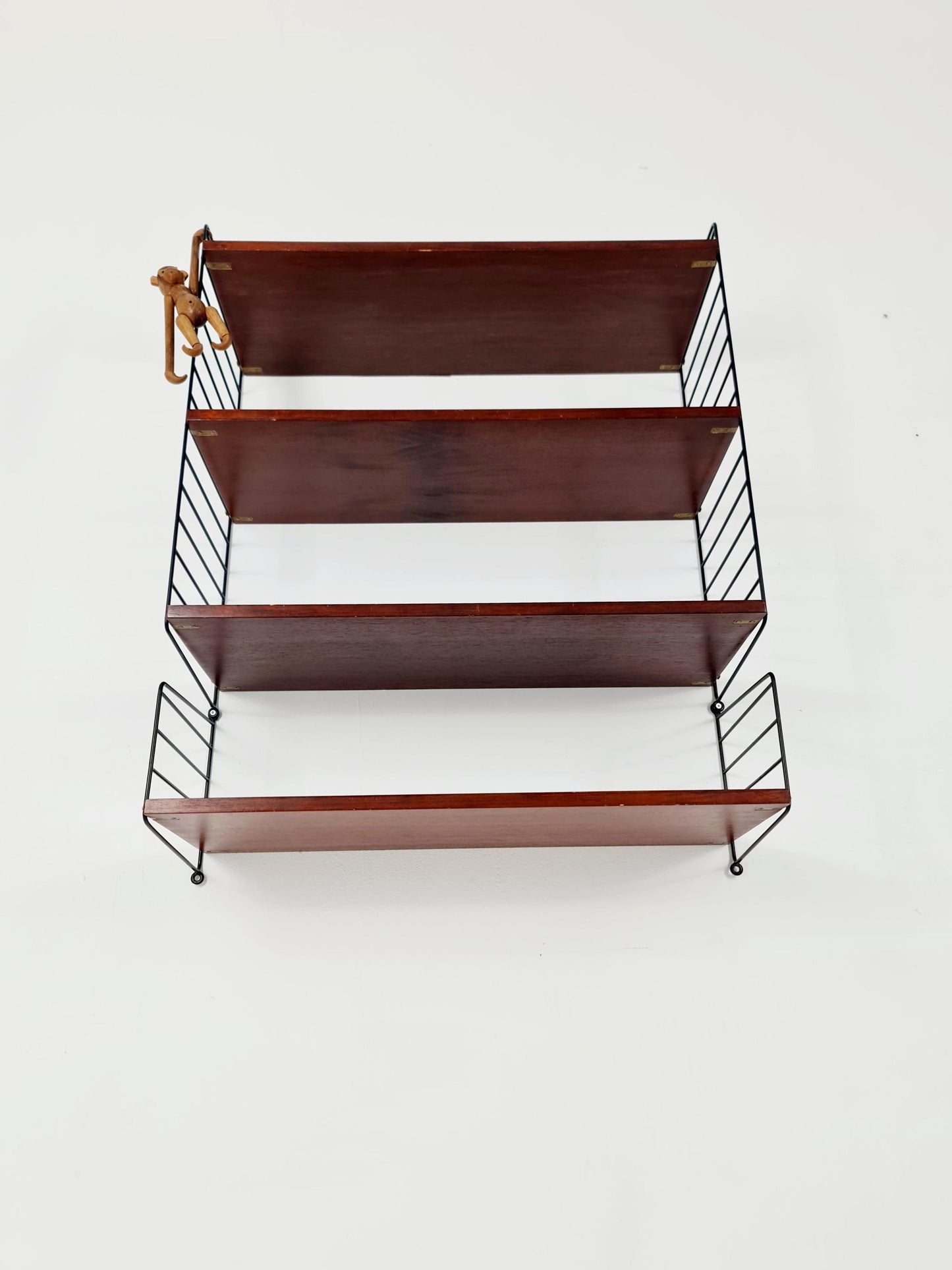 Original MCM Teak shelving system - consists of black lacquered metal ladders, from string Stockholm 1960s