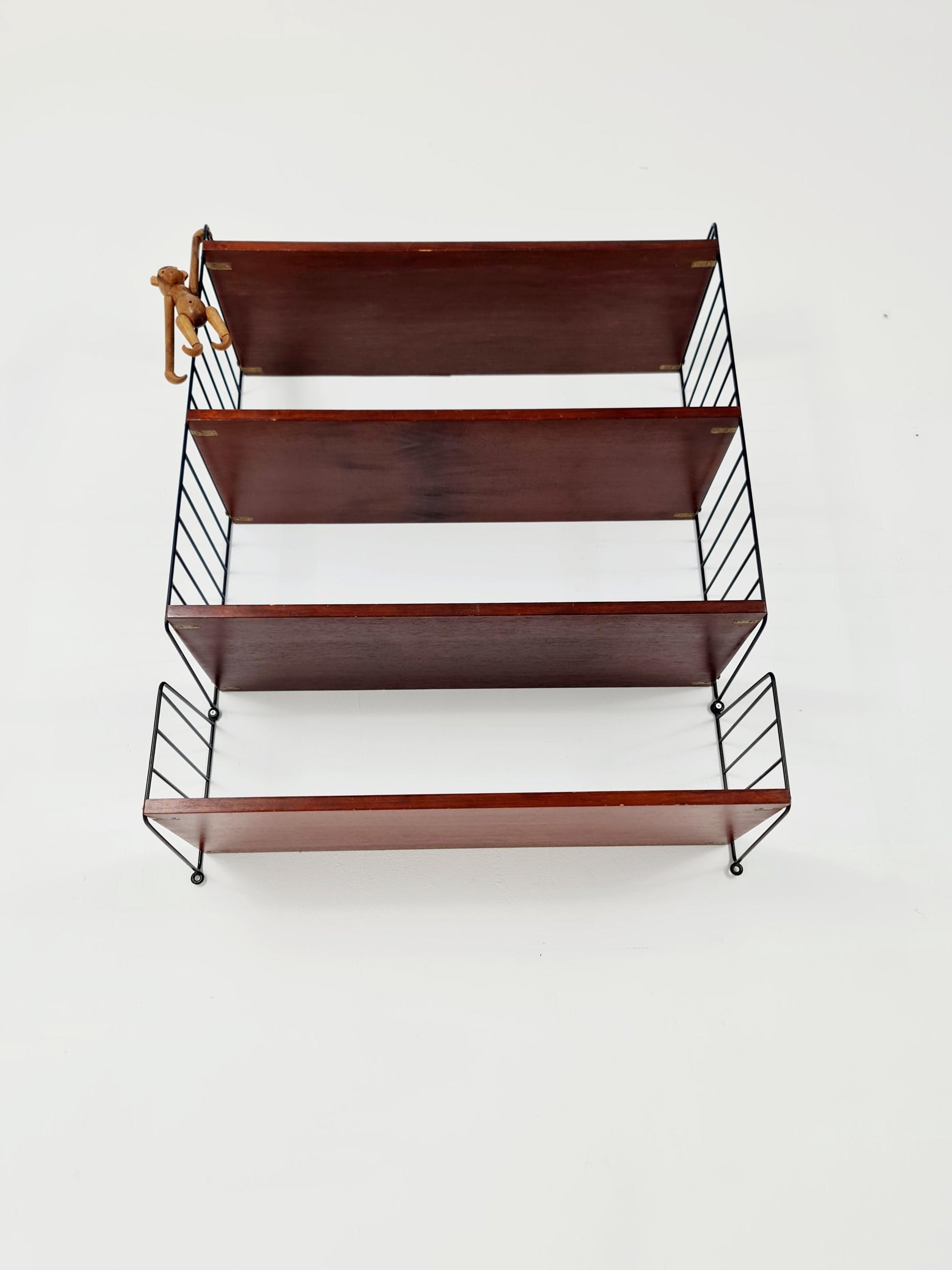 Original MCM Teak shelving system - consists of black lacquered metal ladders, from string Stockholm 1960s