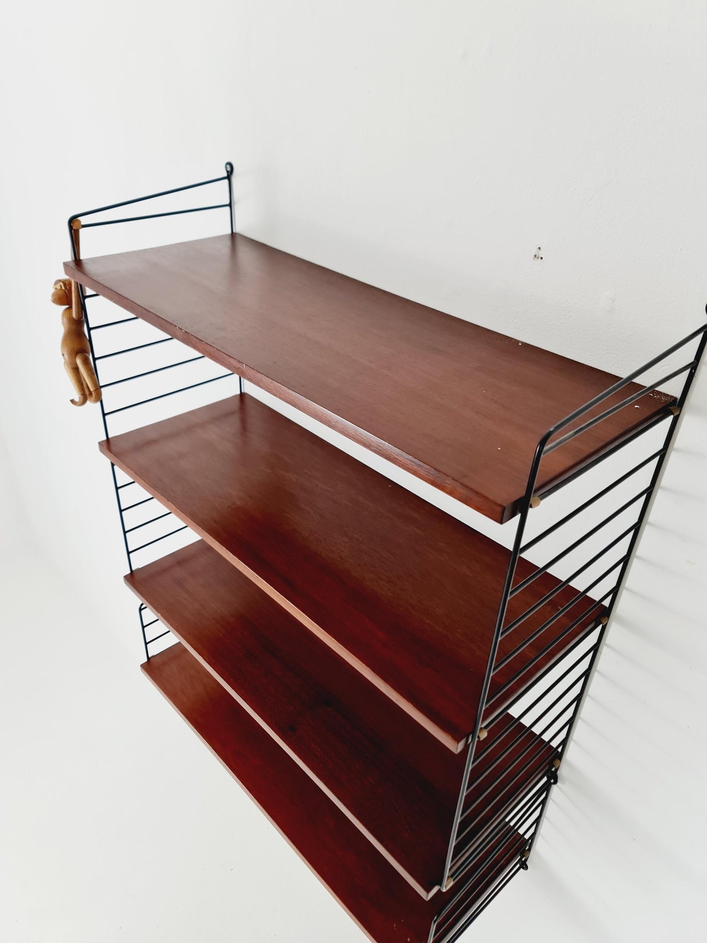 Original MCM Teak shelving system - consists of black lacquered metal ladders, from string Stockholm 1960s