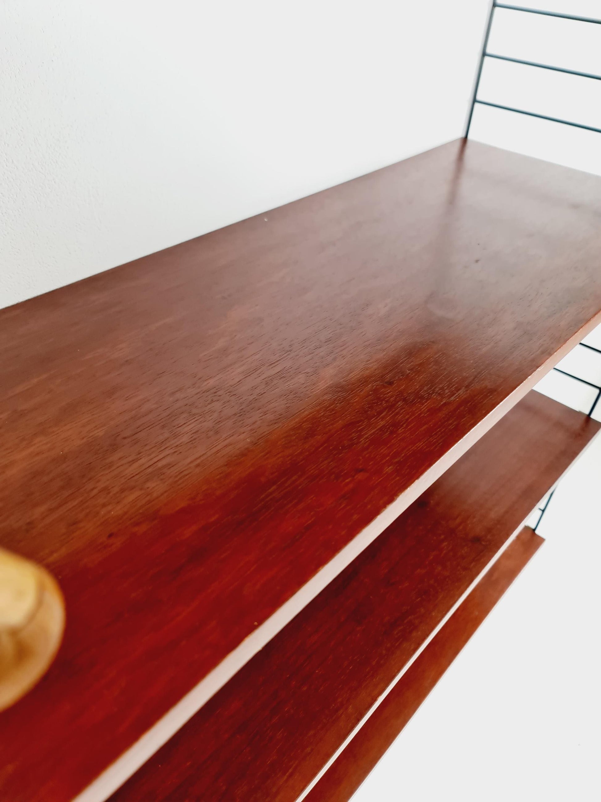 Original MCM Teak shelving system - consists of black lacquered metal ladders, from string Stockholm 1960s