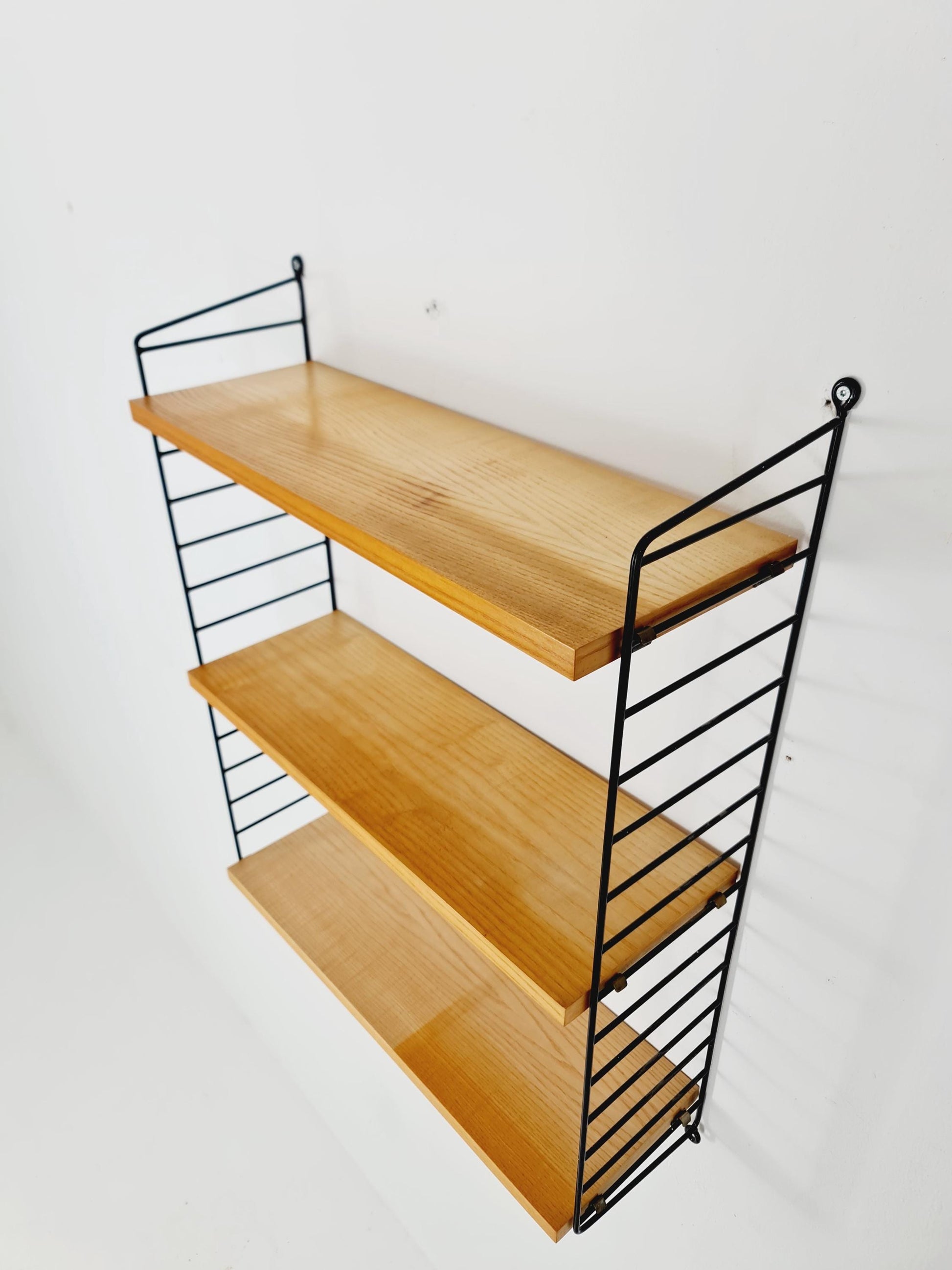 Original MCM Ash shelving system - consists of Black lacquered metal ladders, from string Stockholm 1960s
