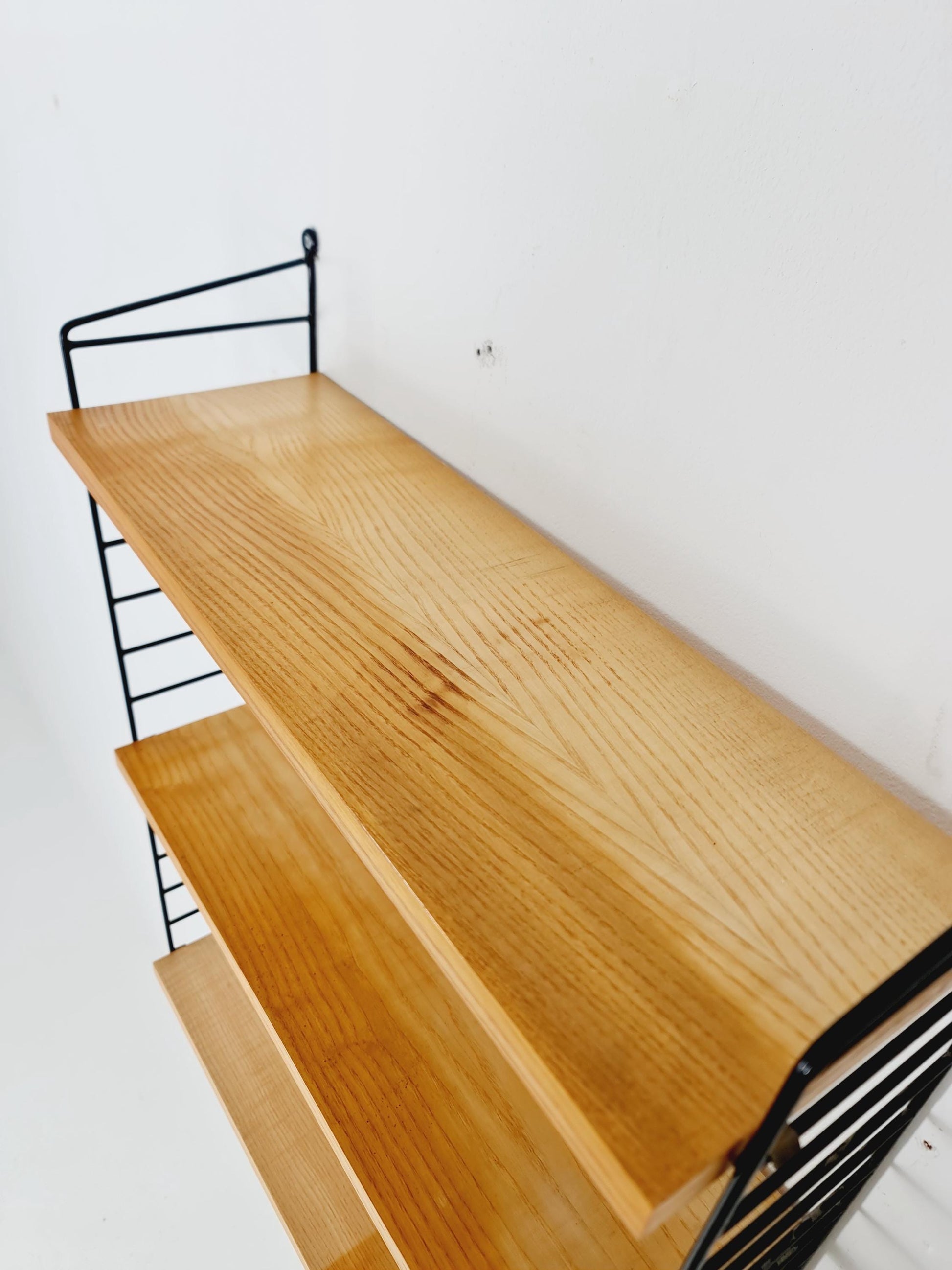 Original MCM Ash shelving system - consists of Black lacquered metal ladders, from string Stockholm 1960s